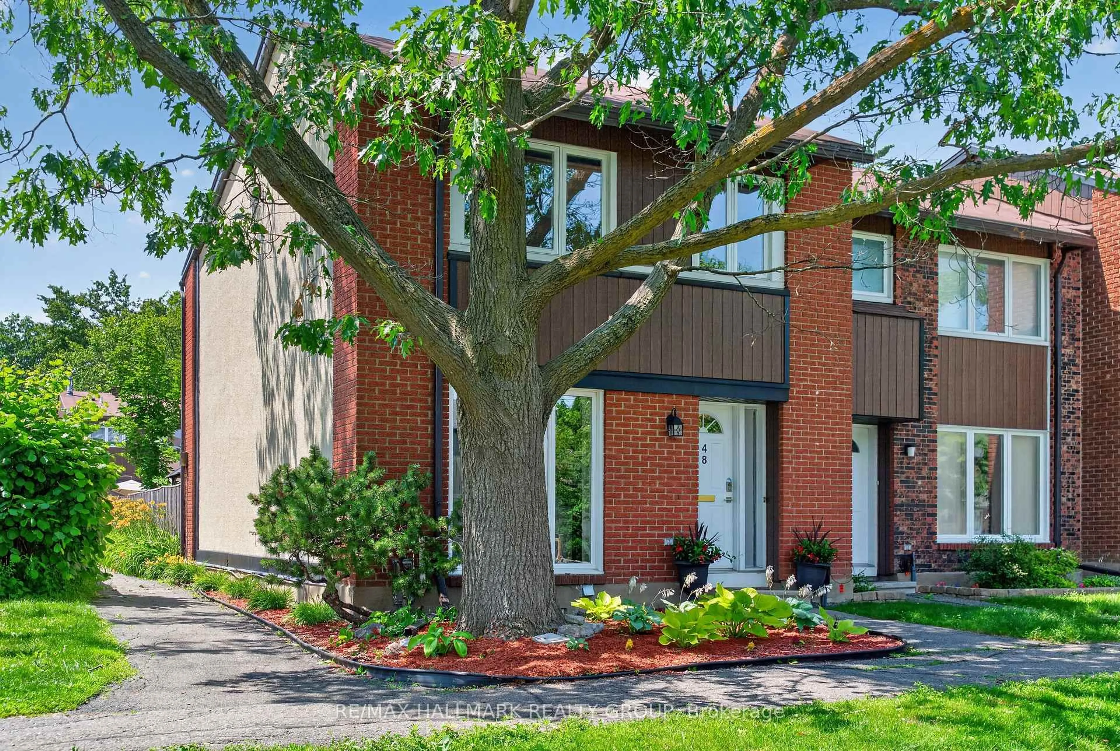 Home with brick exterior material, street for 1900 Marquis Ave #48, Ottawa Ontario K1J 8J2