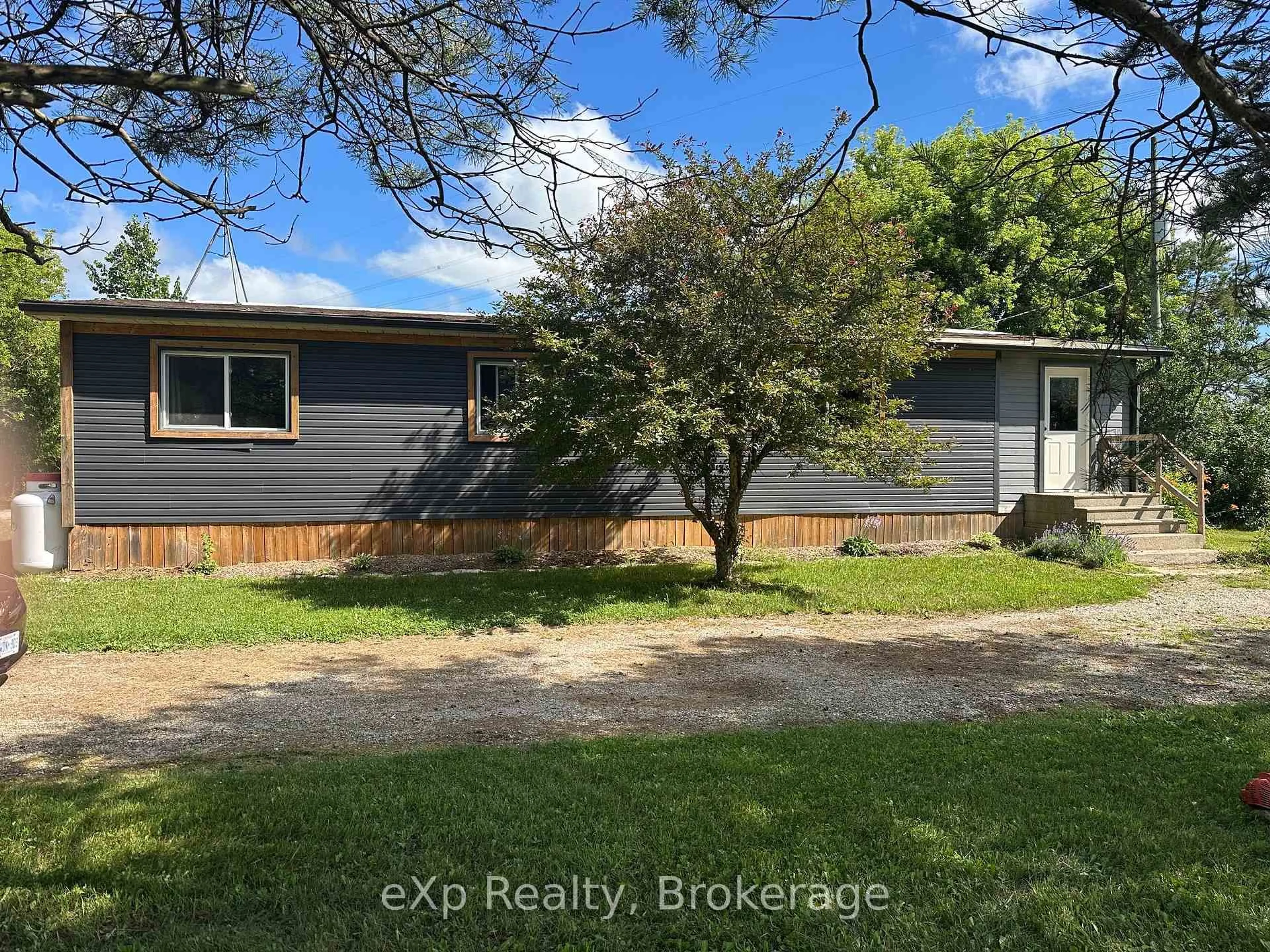 A pic from outside/outdoor area/front of a property/back of a property/a pic from drone, street for 341033 Grey Rd 28, West Grey Ontario N4N 3B9