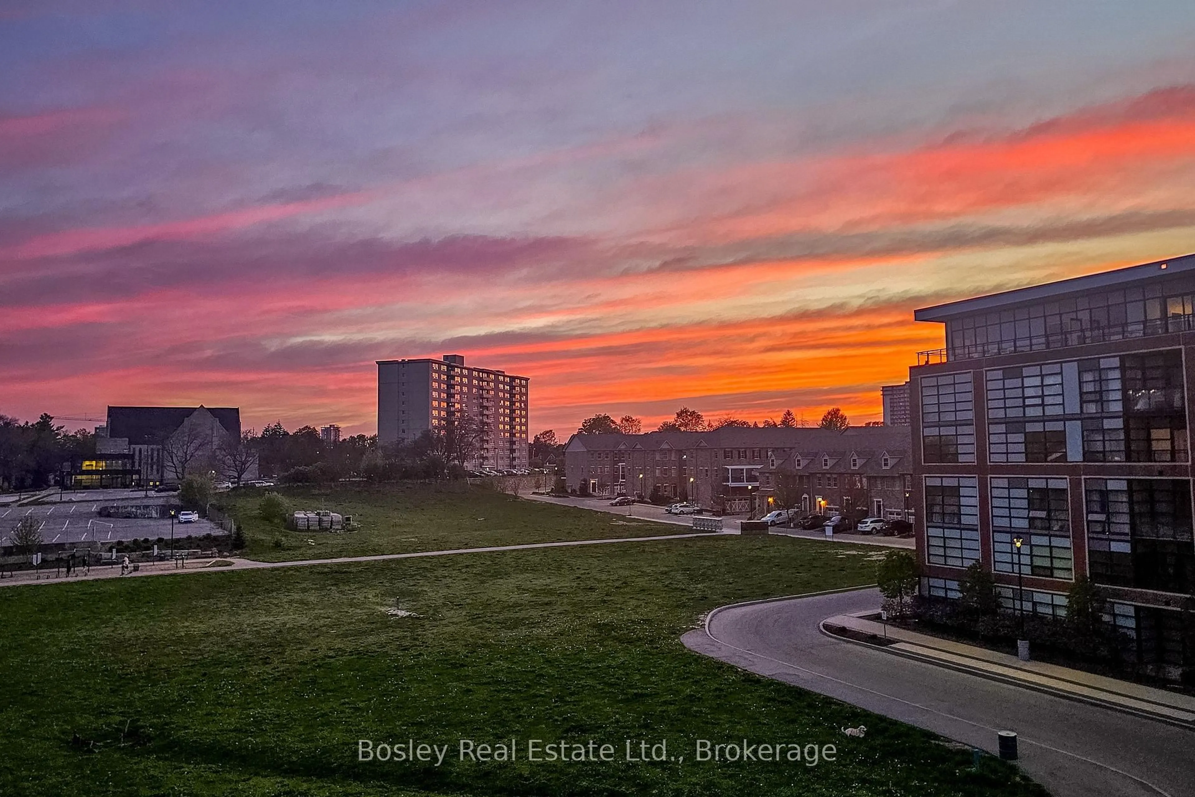 A pic from outside/outdoor area/front of a property/back of a property/a pic from drone, city buildings view from balcony for 155 St Leger St #412, Kitchener Ontario N2H 0B9