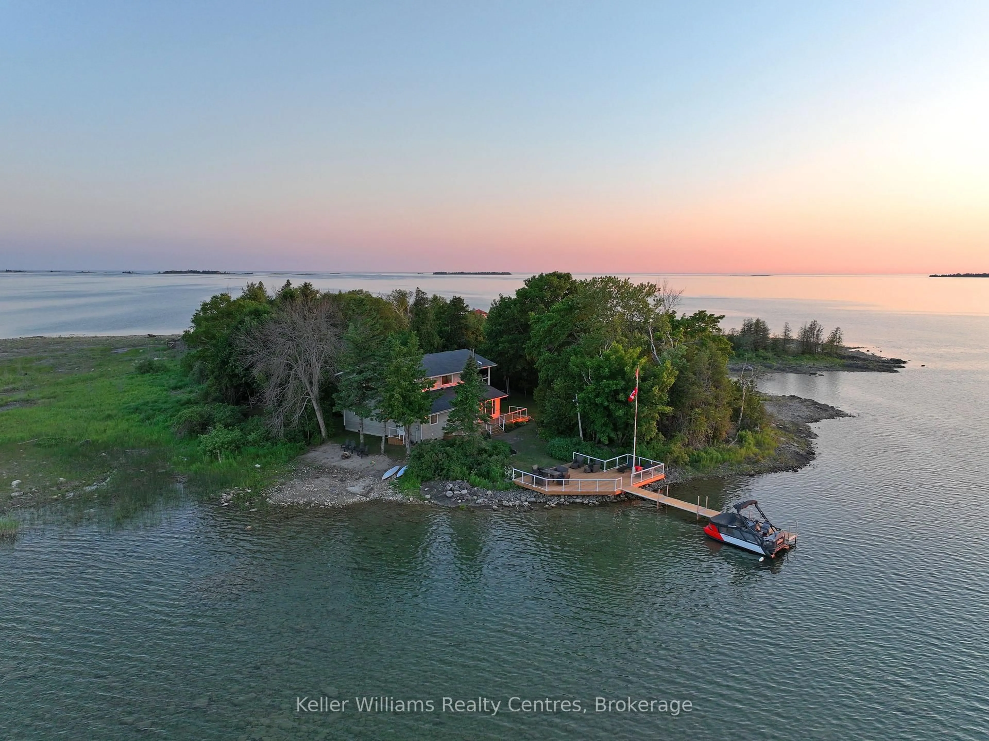 A pic from outside/outdoor area/front of a property/back of a property/a pic from drone, water/lake/river/ocean view for 25 DOCK Rd, South Bruce Peninsula Ontario N0H 2T0