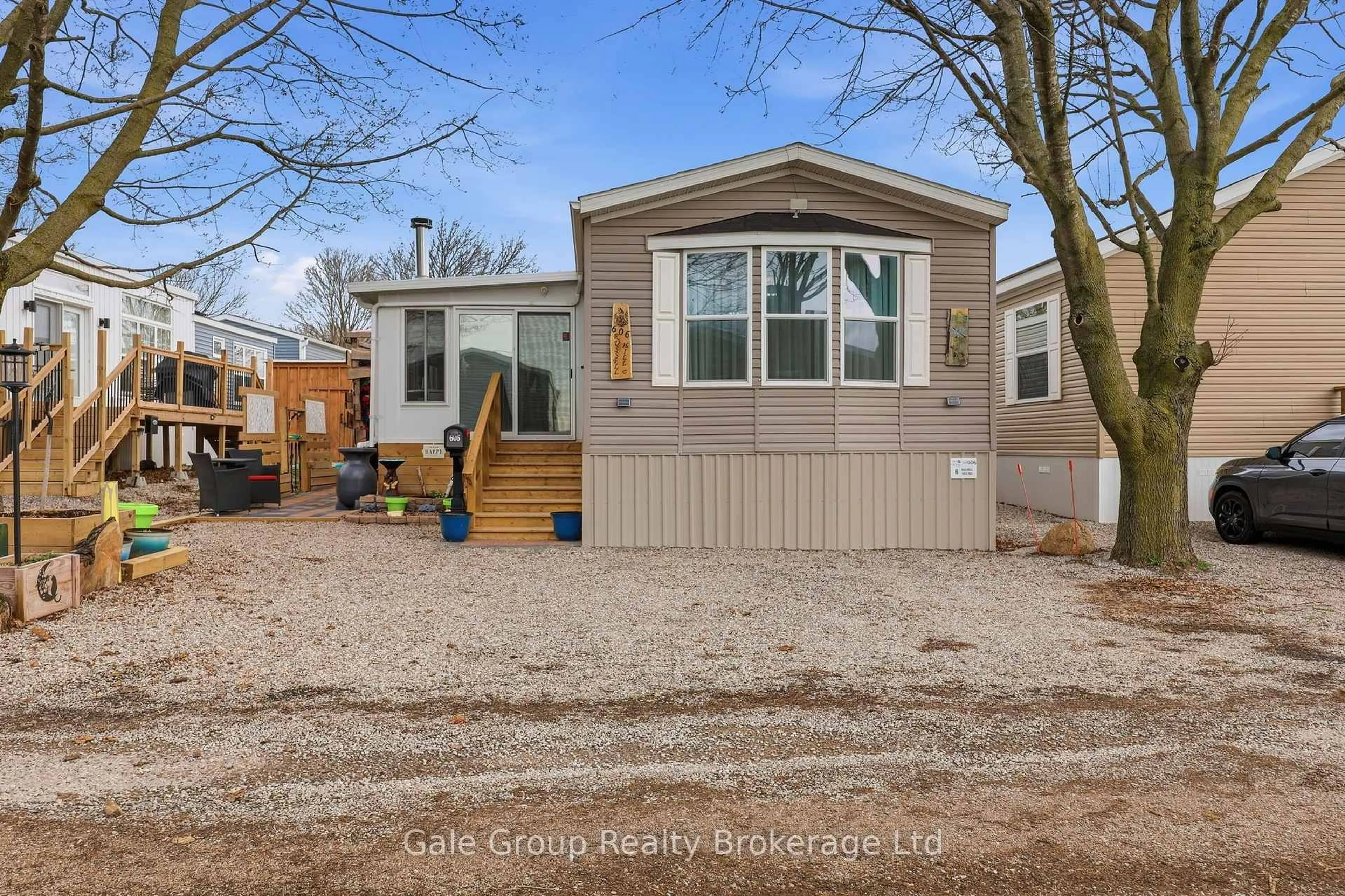 Home with vinyl exterior material, street for 99 Fourth Conc Rd #606, Brant Ontario N0E 1A0