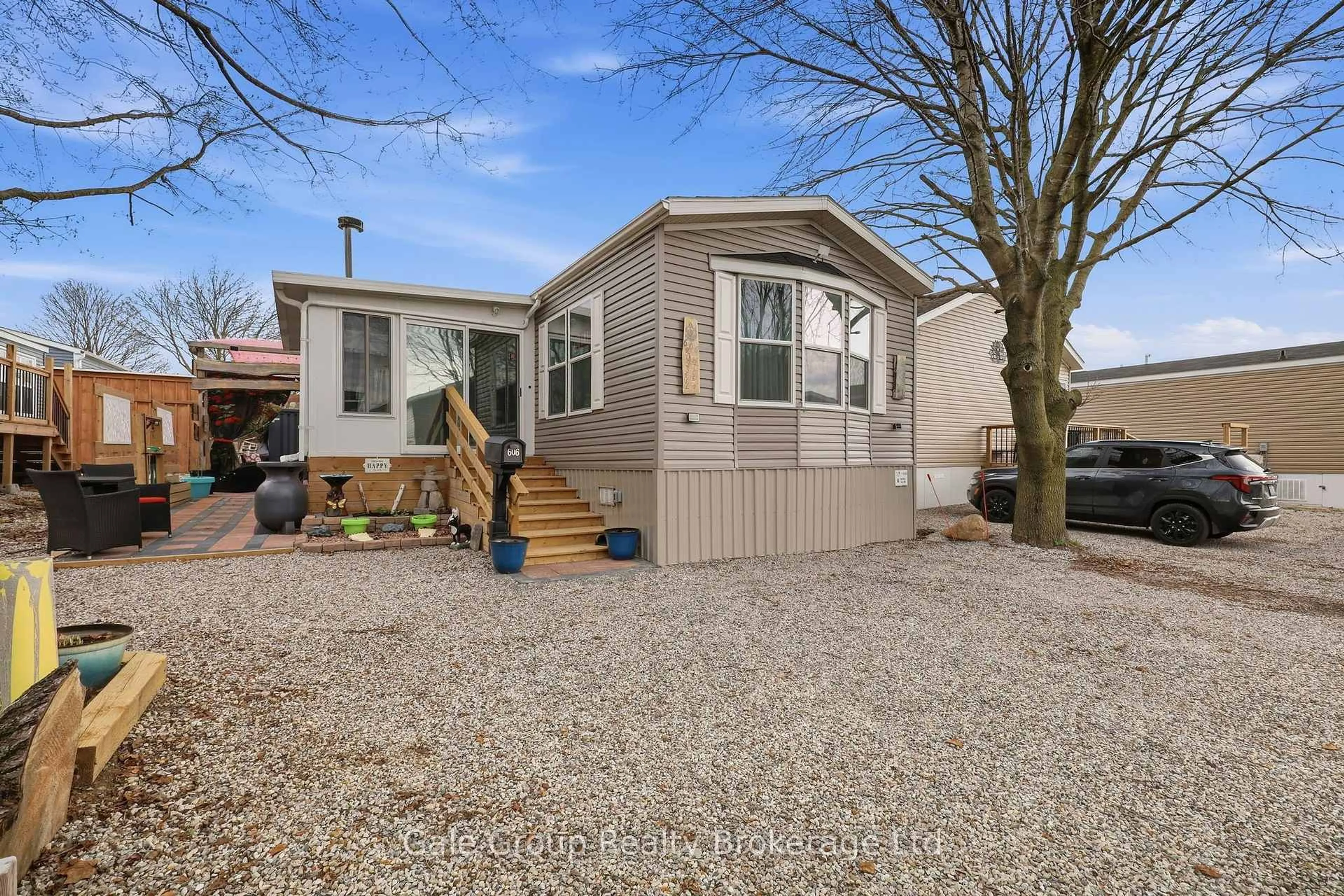 Home with vinyl exterior material, street for 99 Fourth Conc Rd #606, Brant Ontario N0E 1A0