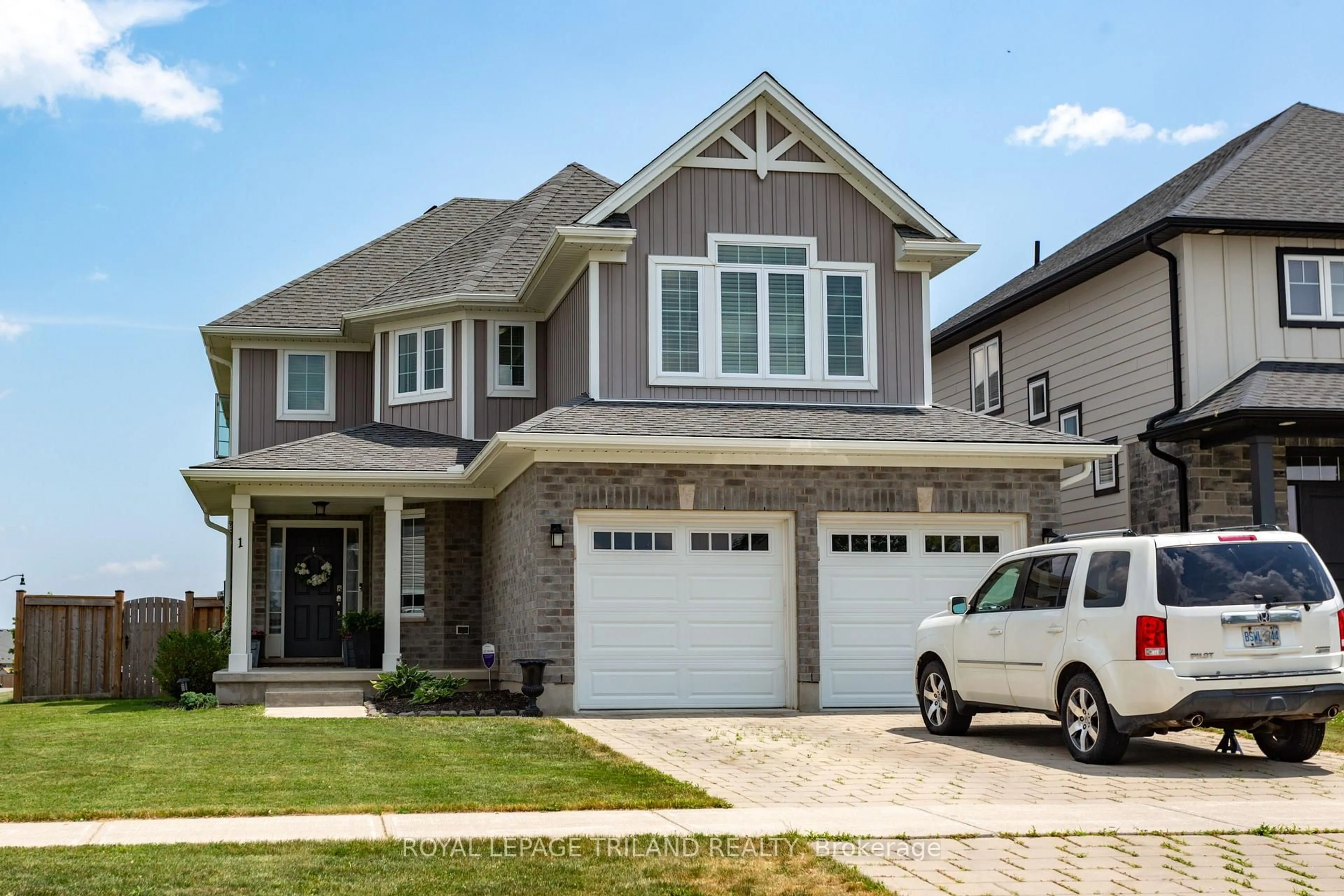 Home with brick exterior material, street for 1 Acorn Tr, St. Thomas Ontario N5R 0H5