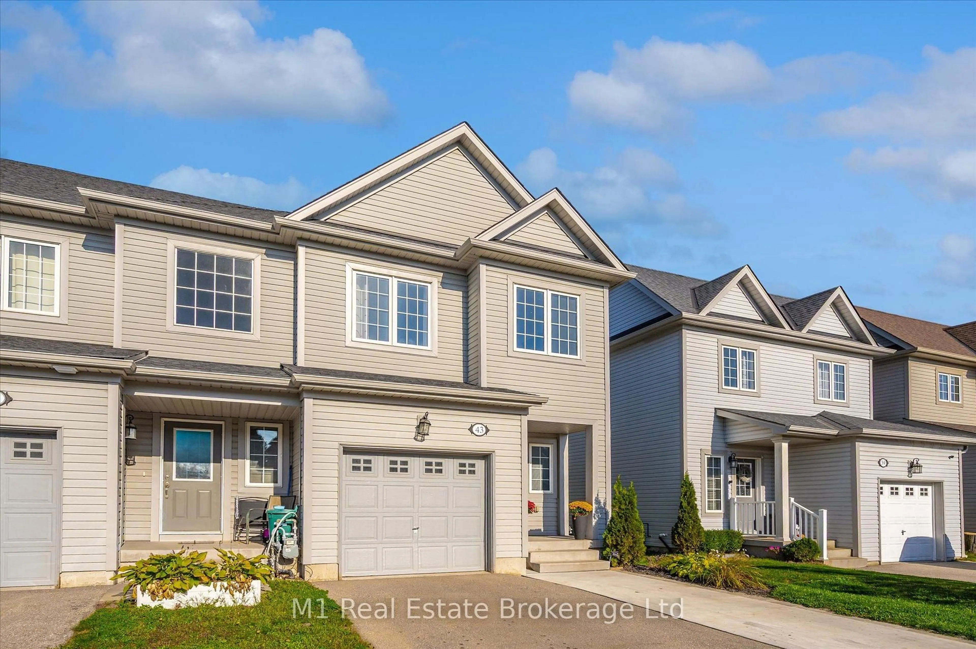 Home with vinyl exterior material, street for 43 Courtney St, Centre Wellington Ontario N1M 0E5