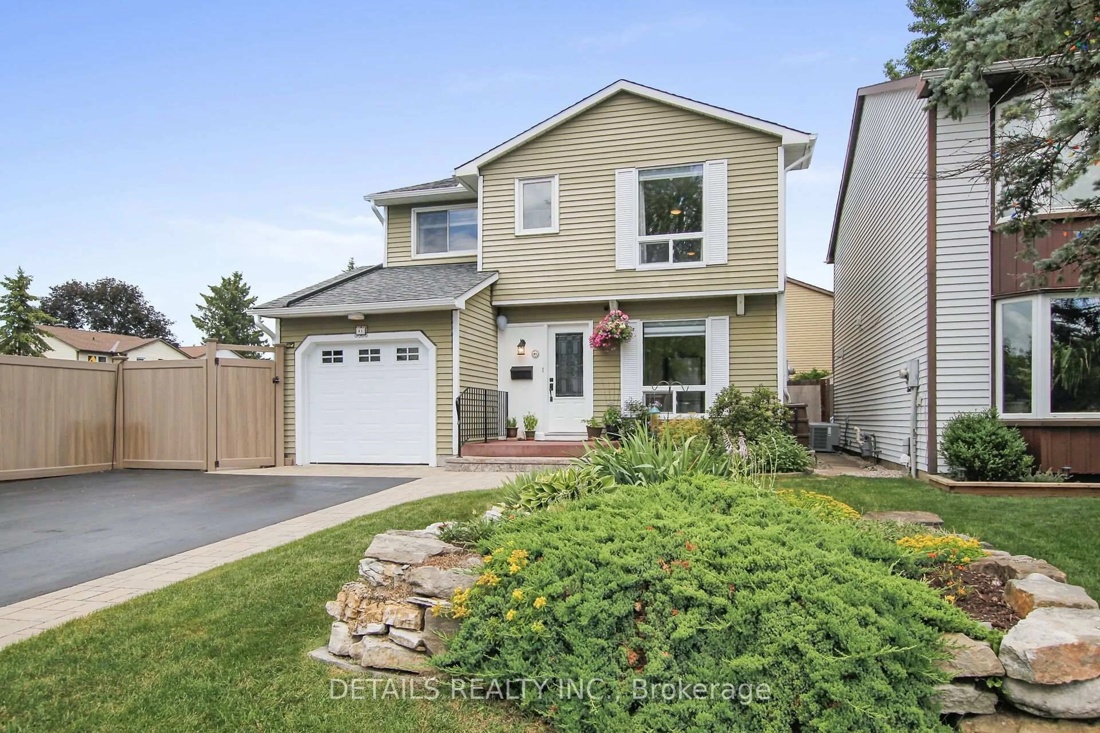 Home with vinyl exterior material, street for 41 Rickey Pl, Kanata Ontario K2L 2H4