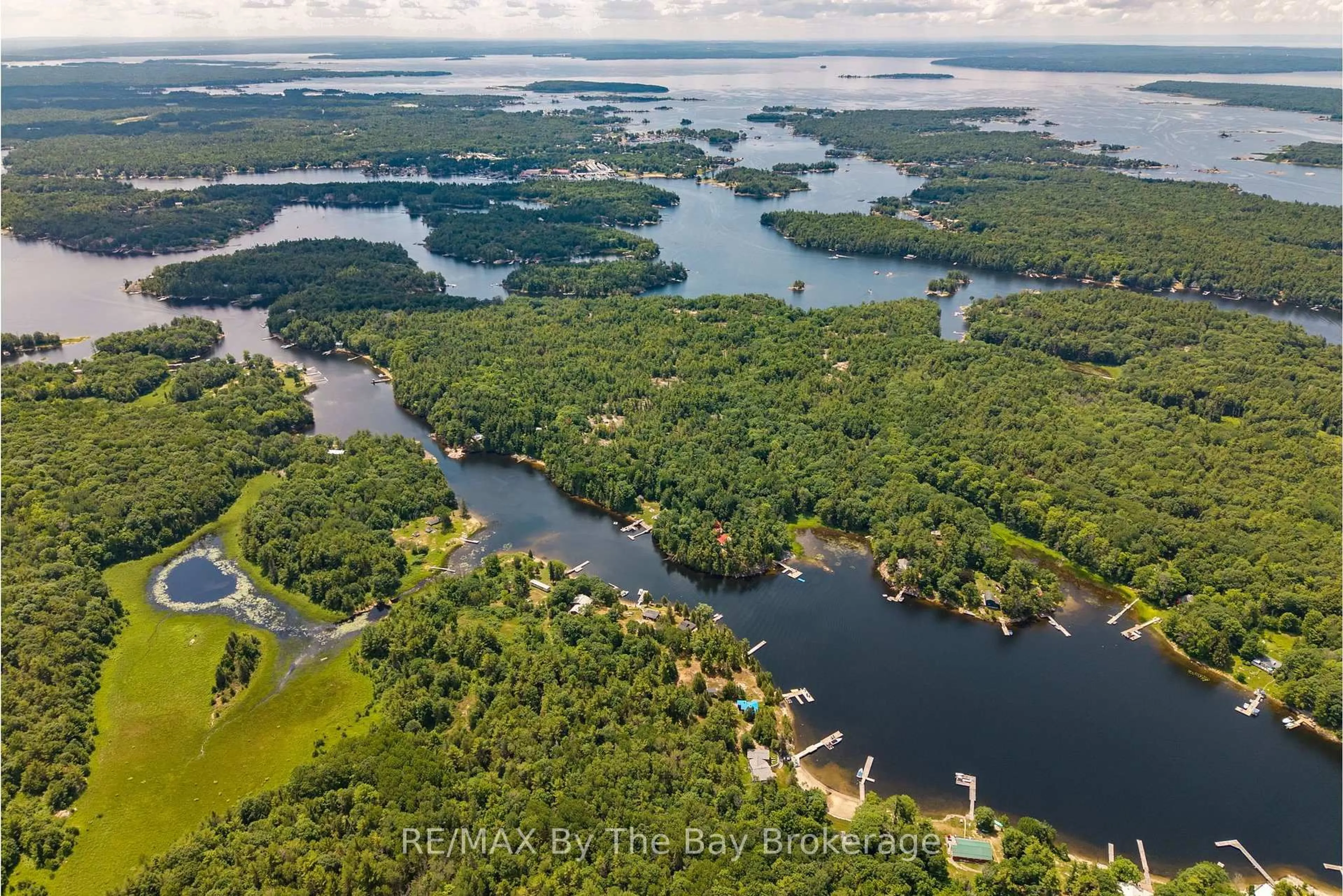 A pic from outside/outdoor area/front of a property/back of a property/a pic from drone, water/lake/river/ocean view for 13626 Georgian Bay Shore, Georgian Bay Ontario L0K 1S0