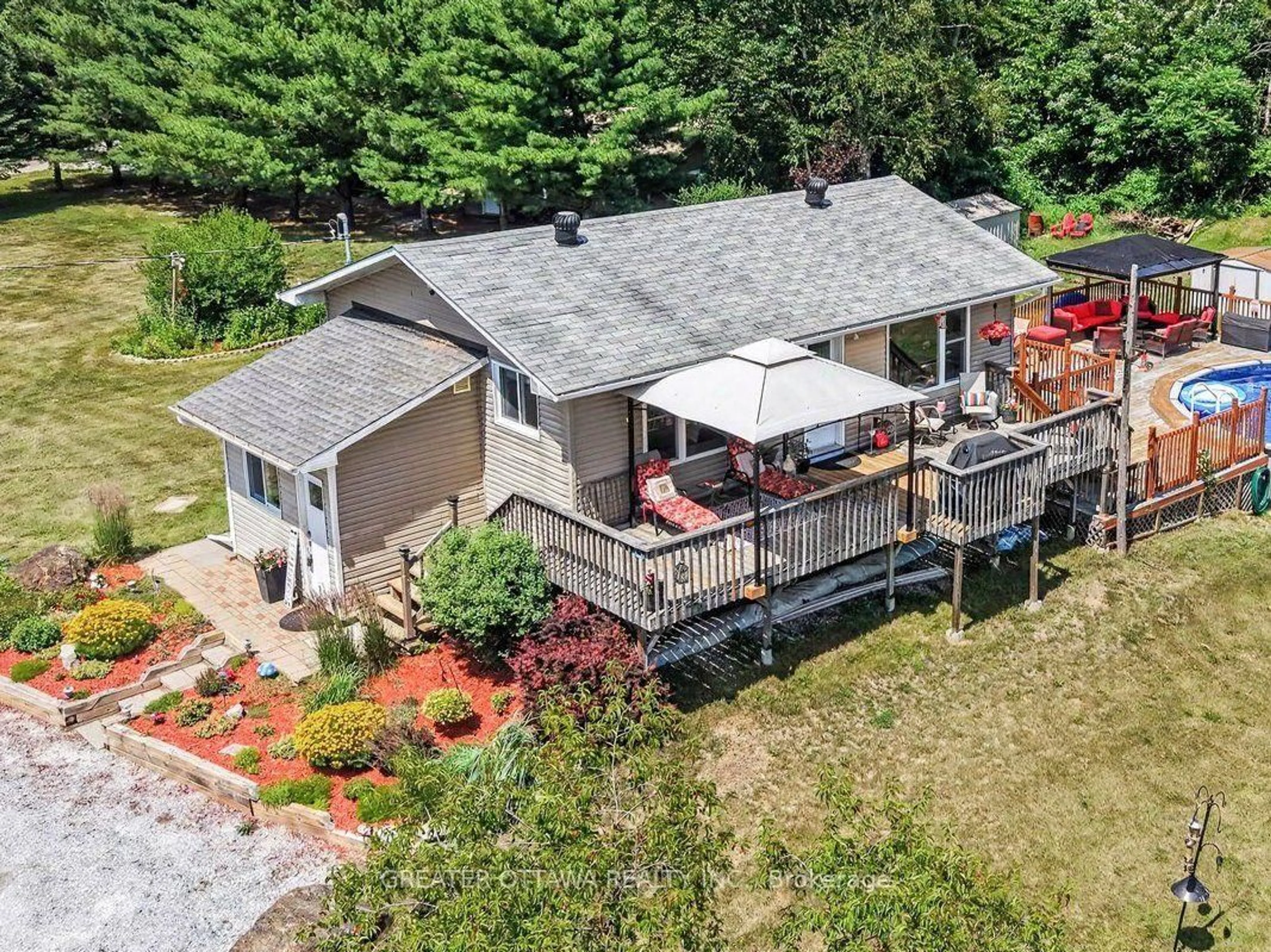 A pic from outside/outdoor area/front of a property/back of a property/a pic from drone, water/lake/river/ocean view for 173 Janet Dr, Clayton Ontario K0A 1P0