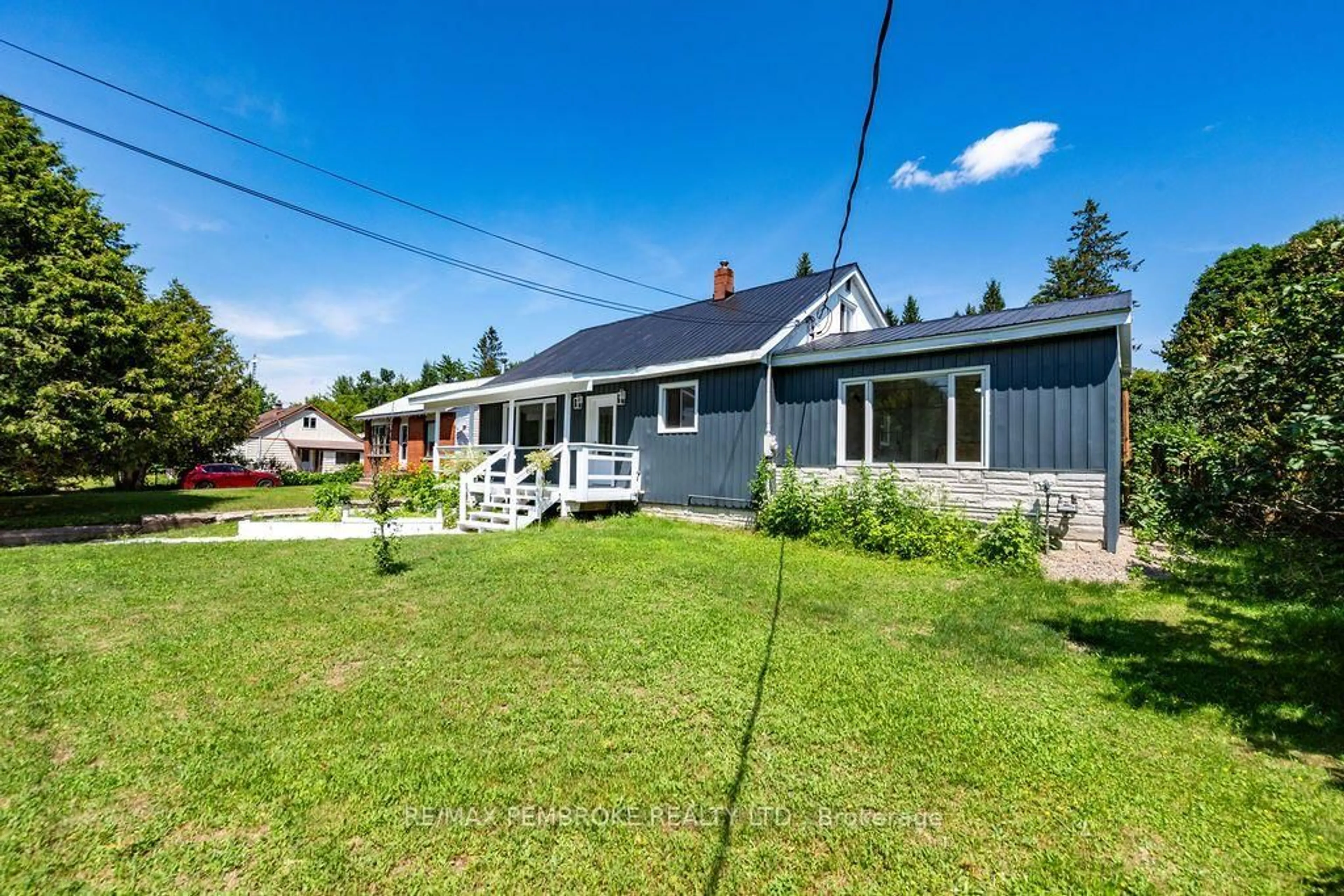 A pic from outside/outdoor area/front of a property/back of a property/a pic from drone, street for 32560 Highway Highway, Deep River Ontario K0J 1P0