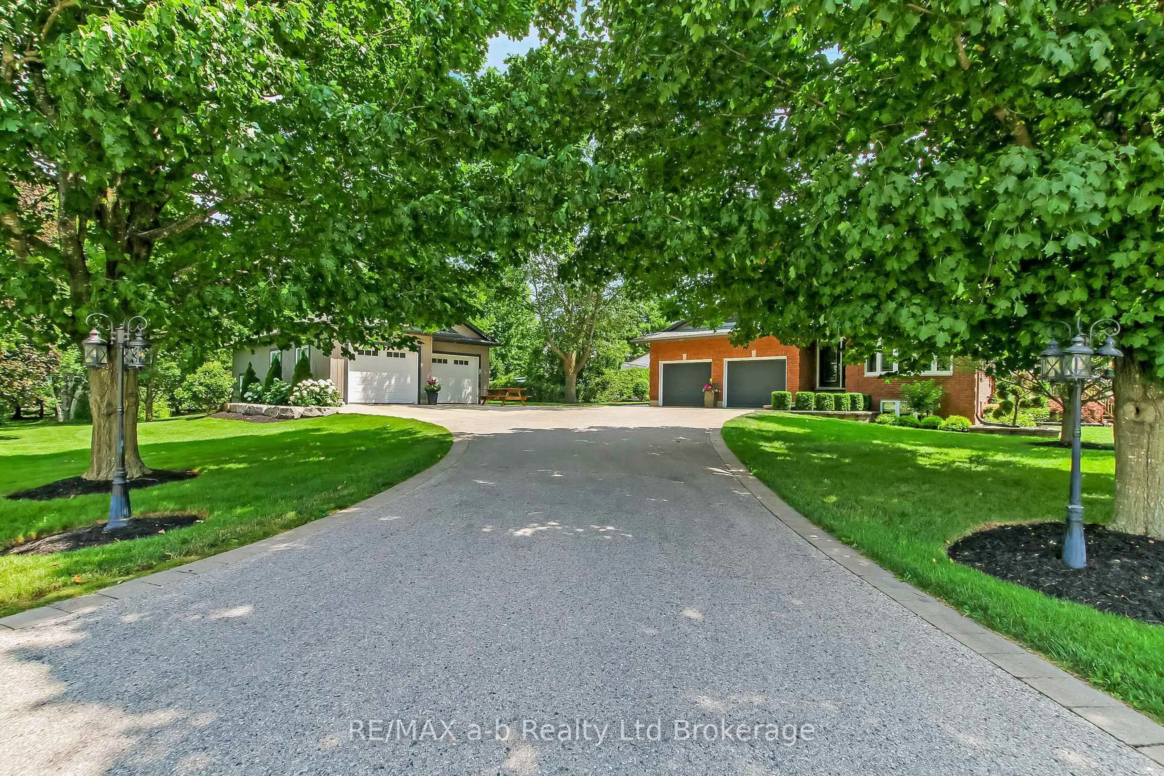 A pic from outside/outdoor area/front of a property/back of a property/a pic from drone, street for 325840 Norwich Rd, Norwich Ontario N0J 1P0