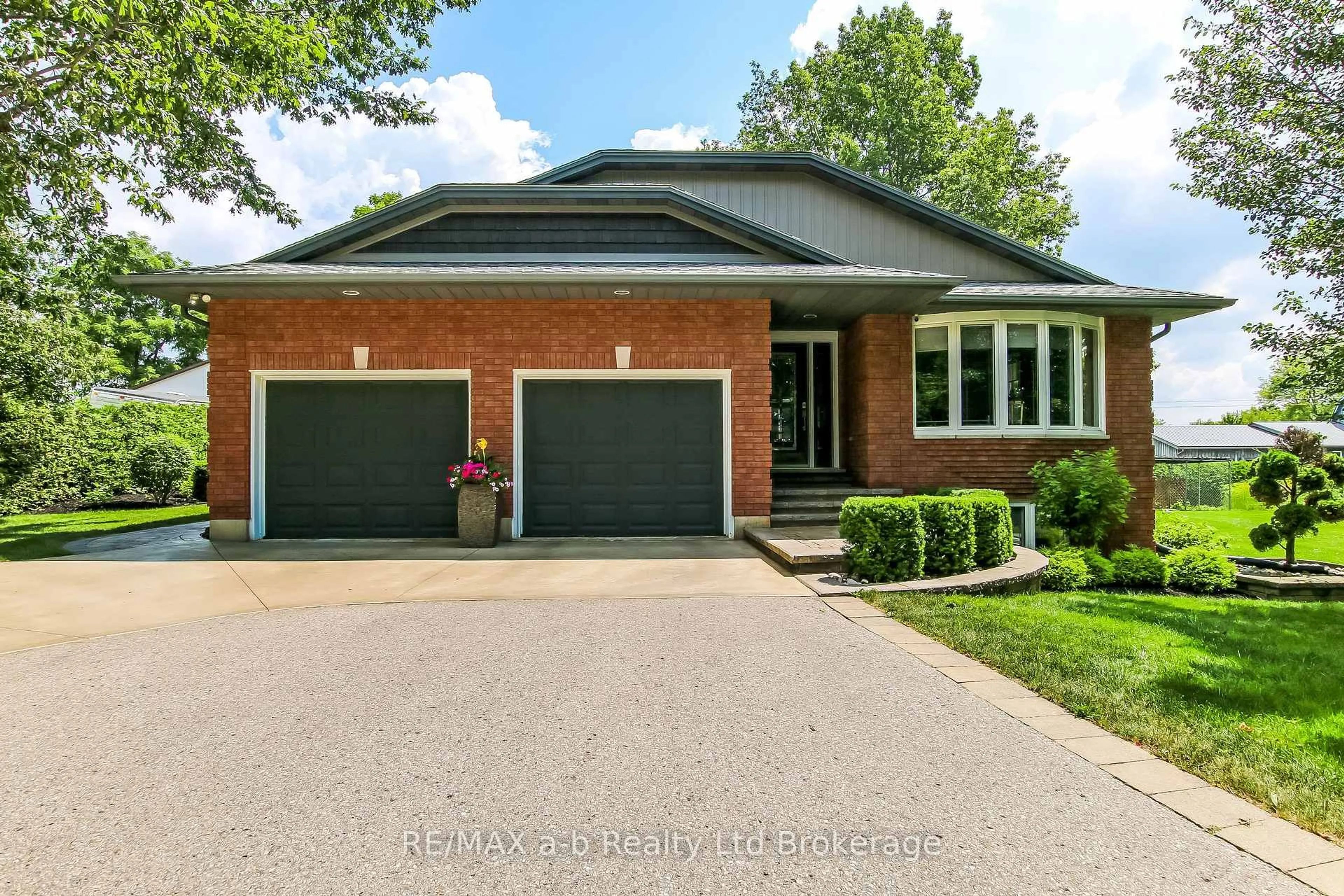 Home with brick exterior material, street for 325840 Norwich Rd, Norwich Ontario N0J 1P0