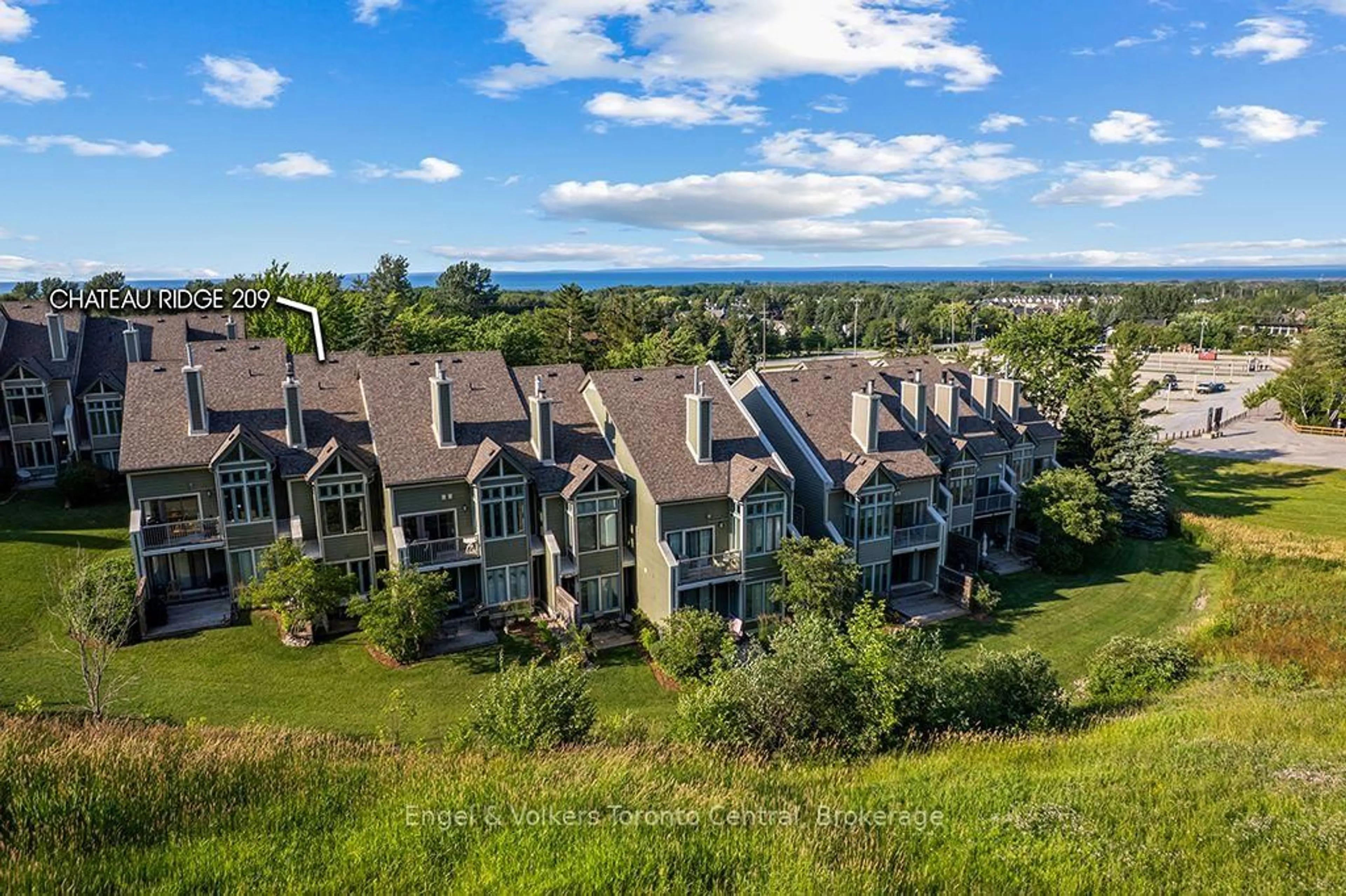A pic from outside/outdoor area/front of a property/back of a property/a pic from drone, water/lake/river/ocean view for 796404 Grey Road 19 Rd #209, Blue Mountains Ontario L9Y 0N8