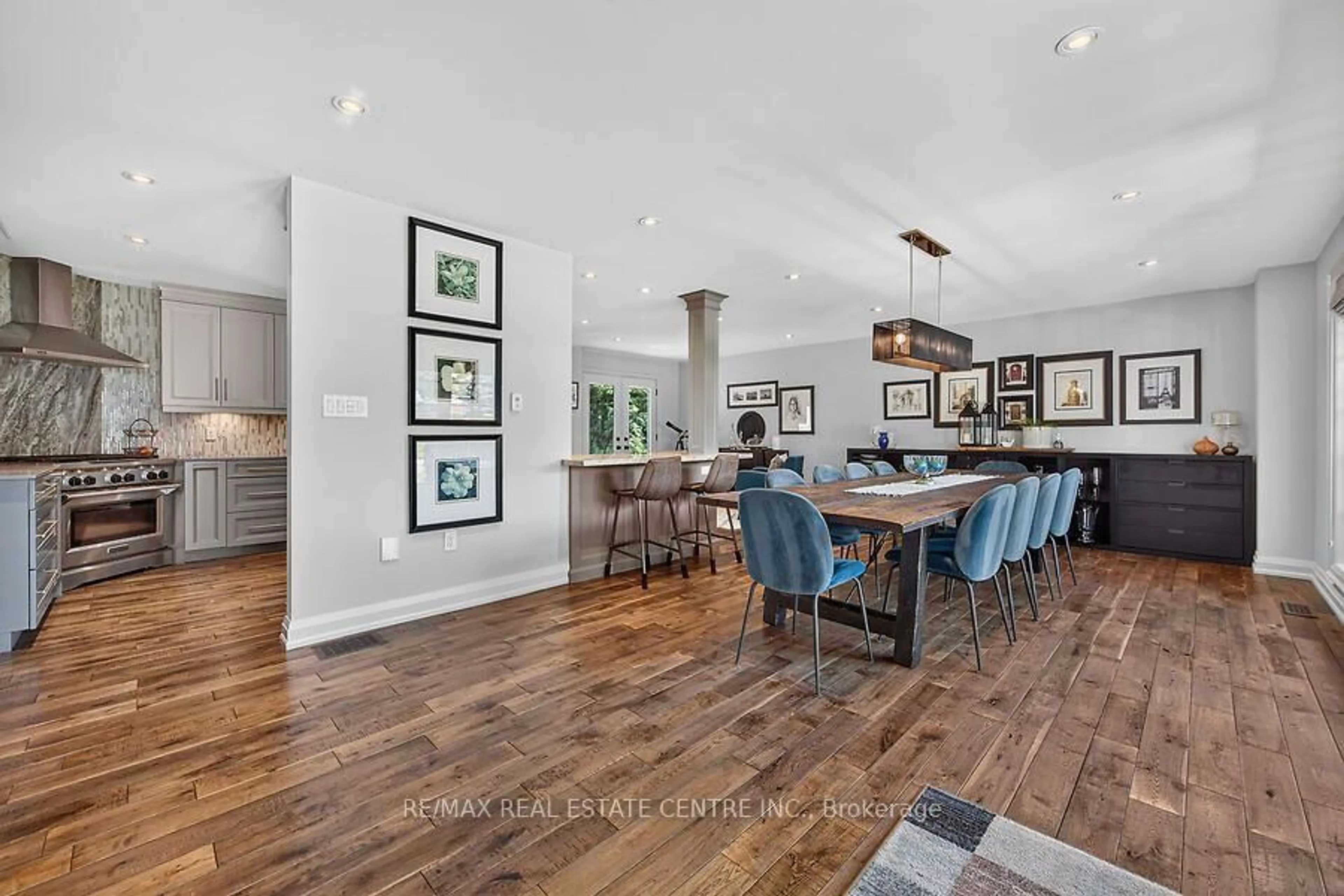 Open concept kitchen, wood/laminate floor for 26 Freeland Crt, Hamilton Ontario L8S 3R5