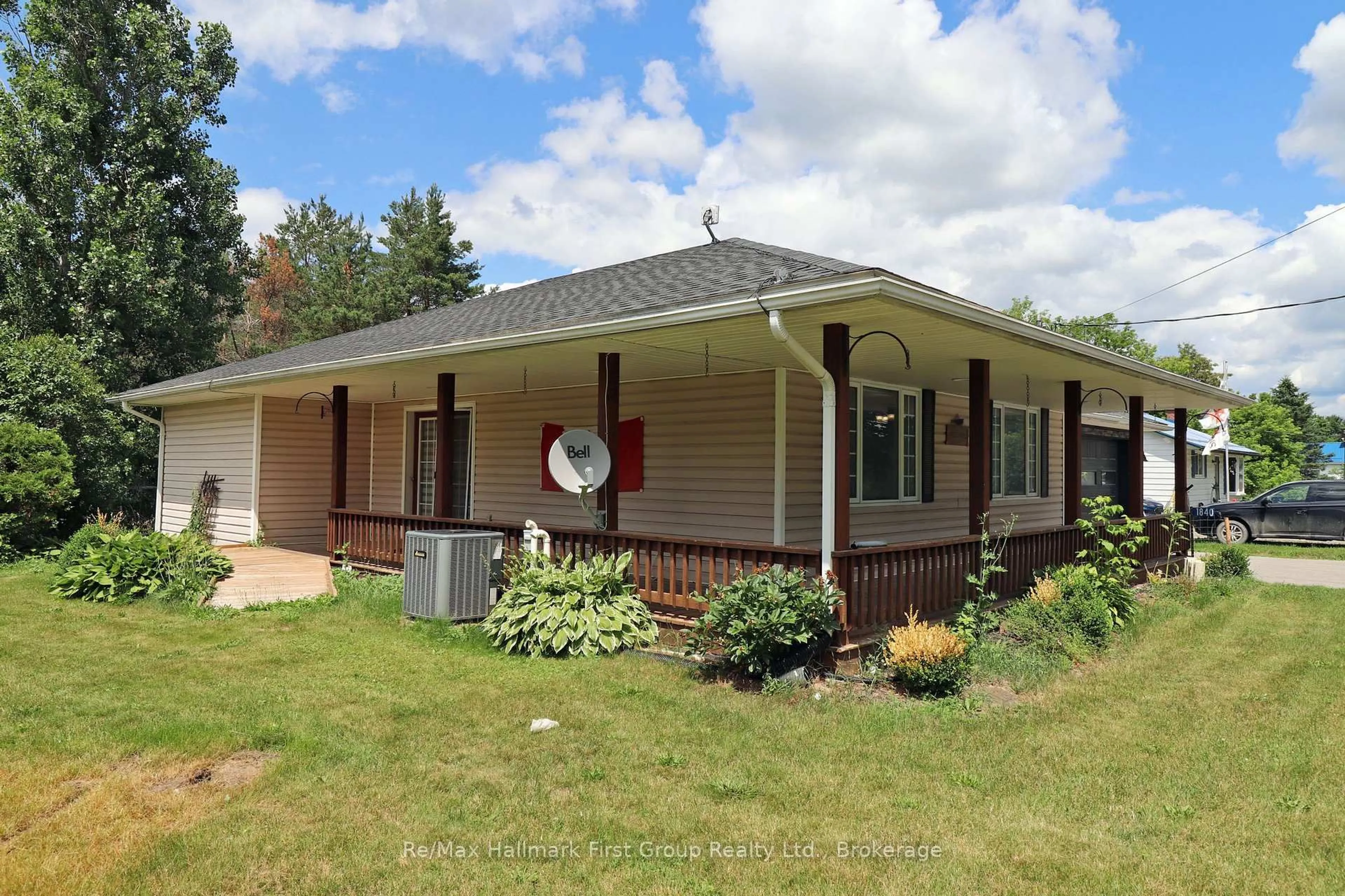 Home with vinyl exterior material, street for 1840 Queensborough Rd, Madoc Ontario K0K 2K0