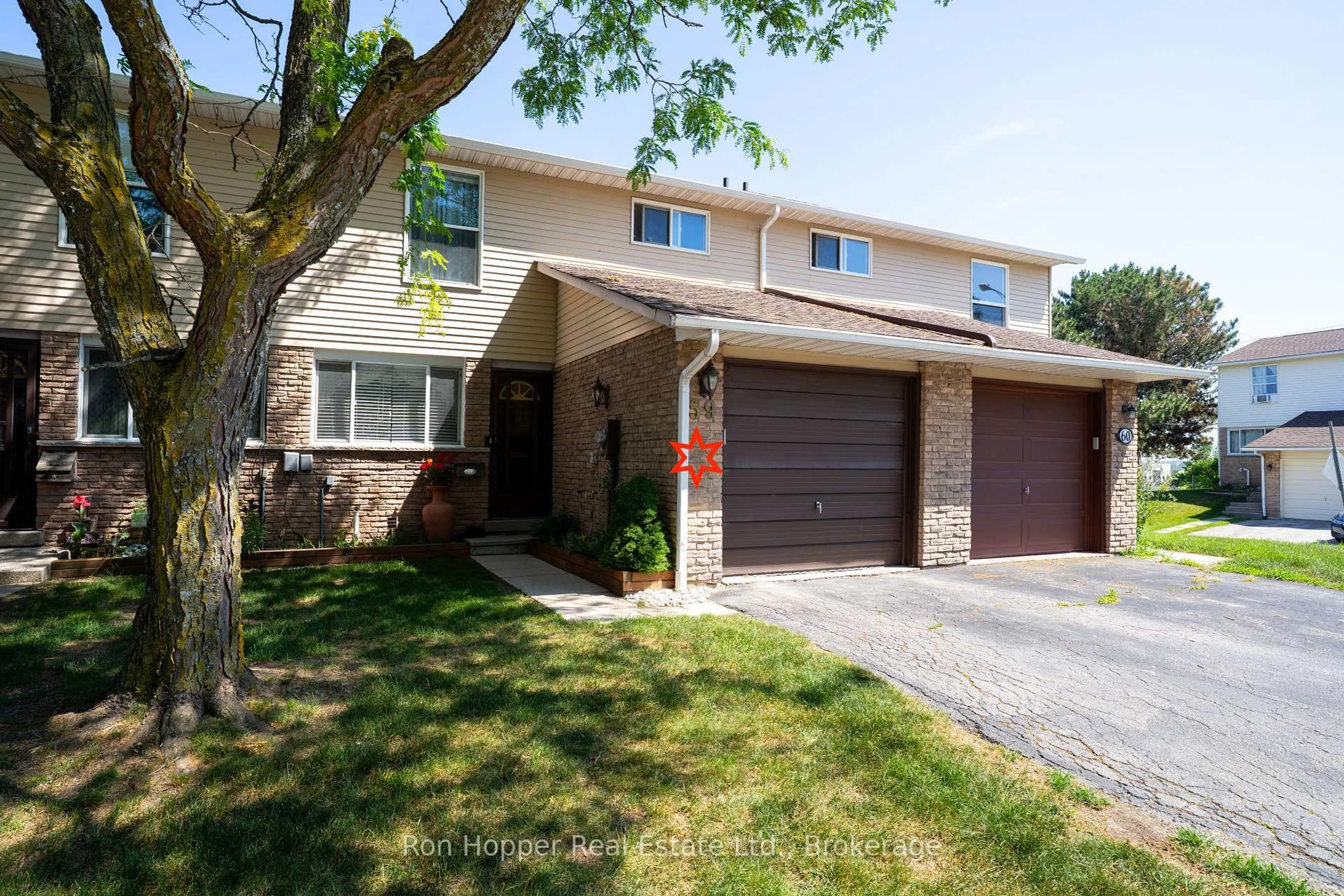 Home with brick exterior material, street for 59 Lila Rd #59, Owen Sound Ontario N4K 6C2
