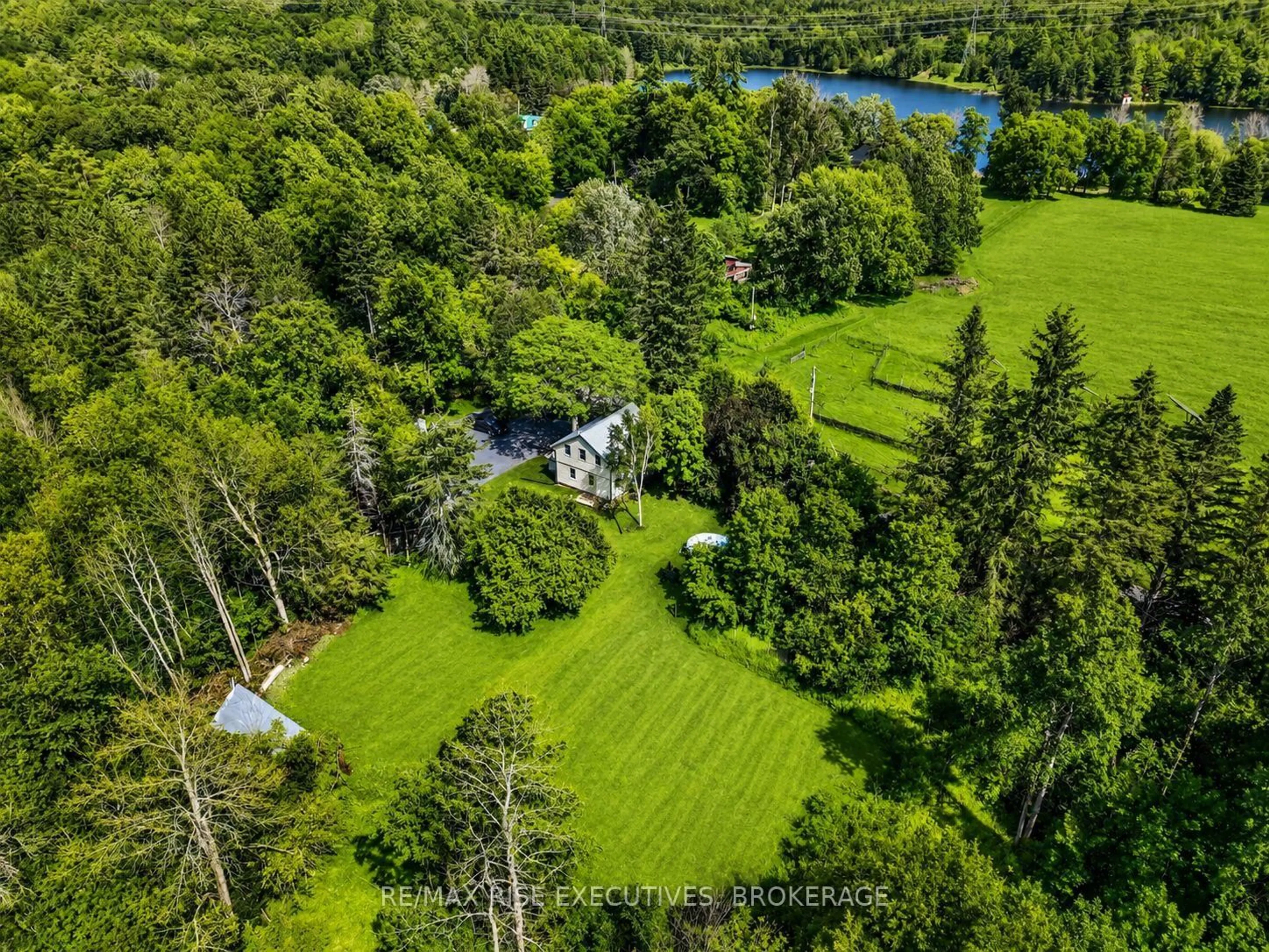 A pic from outside/outdoor area/front of a property/back of a property/a pic from drone, water/lake/river/ocean view for 6729 Craig Rd, Verona Ontario K0H 2W0