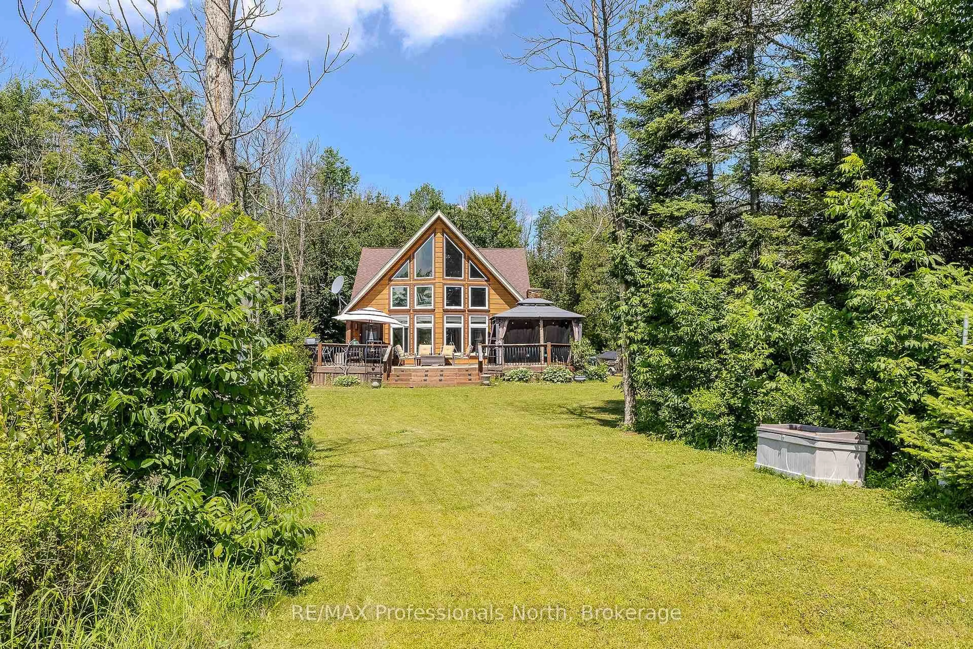 A pic from outside/outdoor area/front of a property/back of a property/a pic from drone, water/lake/river/ocean view for 1367 Pickerel and Jack Lake Rd, Armour Ontario P0A 1C0
