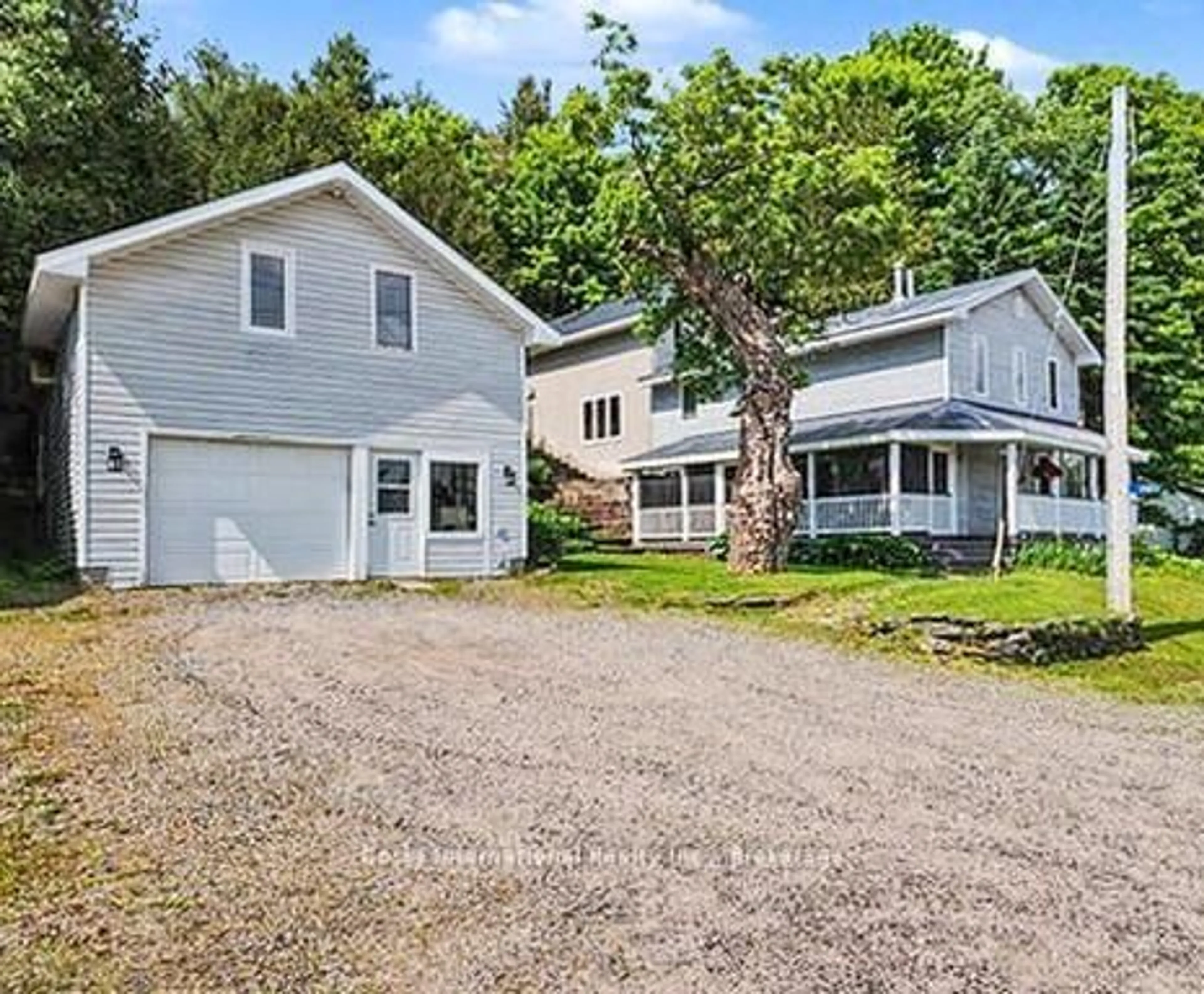 A pic from outside/outdoor area/front of a property/back of a property/a pic from drone, street for 206 ON-141 Highway, Huntsville Ontario P0B 1M0
