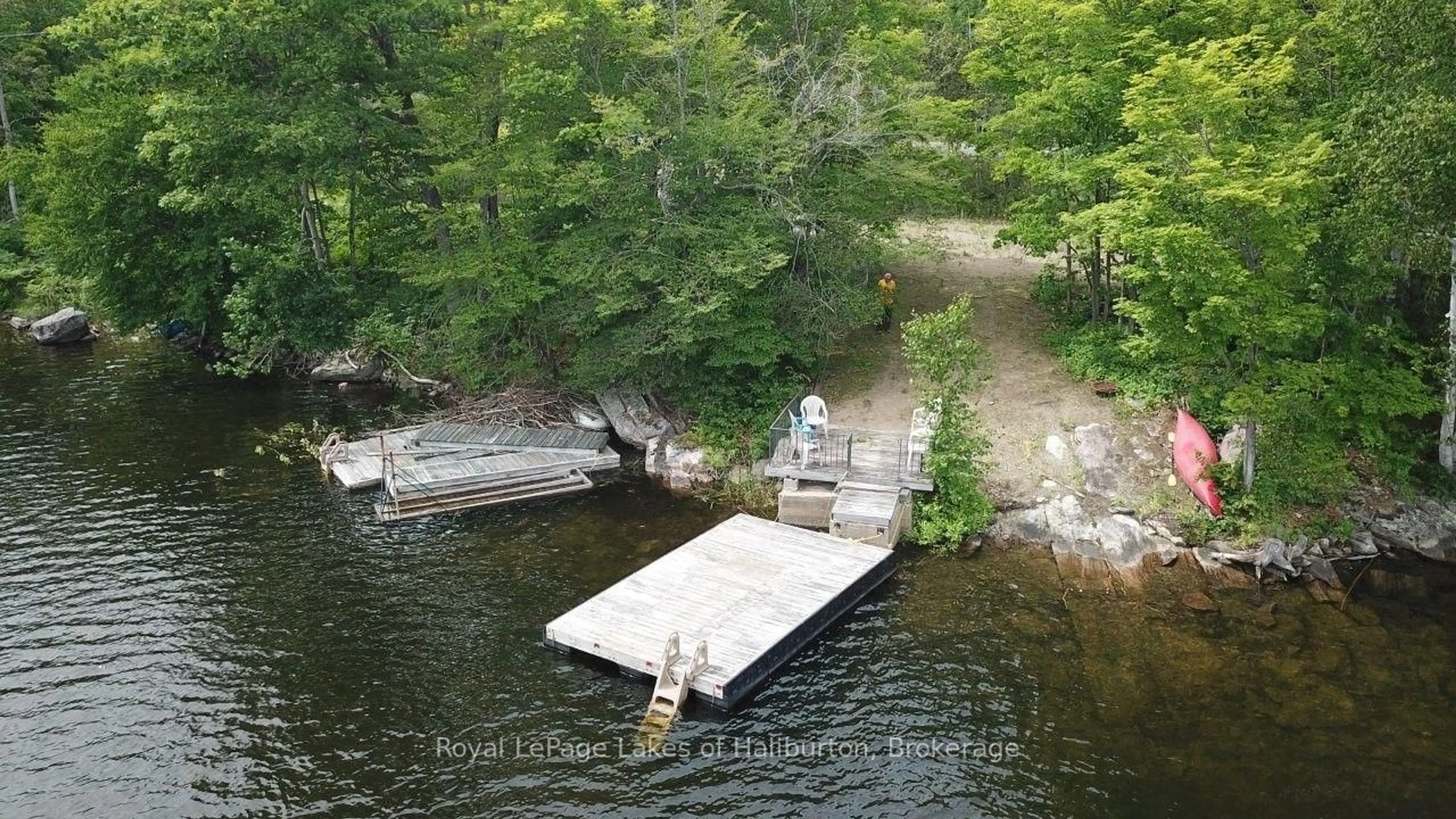 A pic from outside/outdoor area/front of a property/back of a property/a pic from drone, water/lake/river/ocean view for 3040 Haliburton Lake Rd, Dysart et al Ontario K0M 1S0