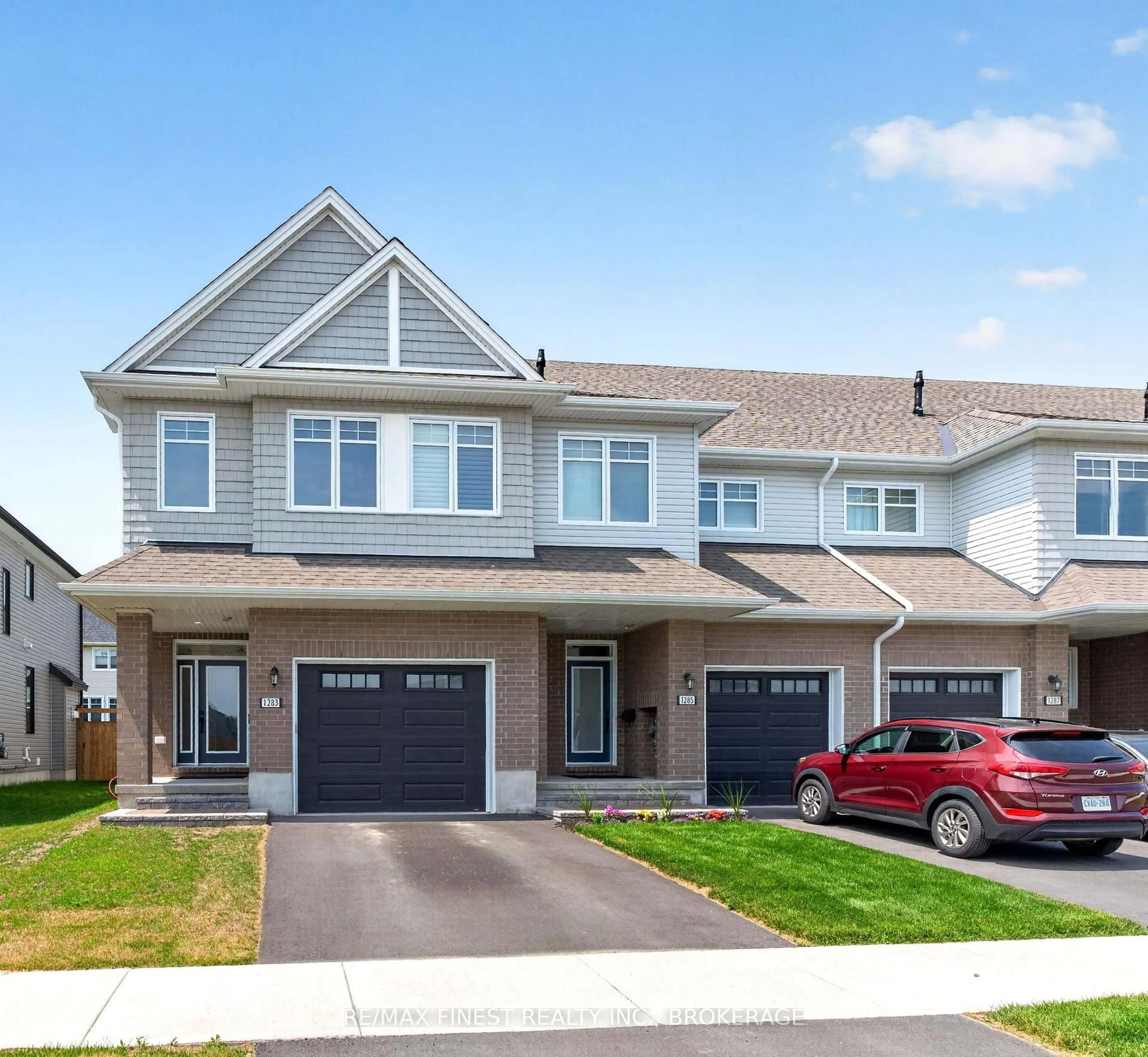 Home with vinyl exterior material, street for 1283 Delancey Dr, Kingston Ontario K7M 0H5