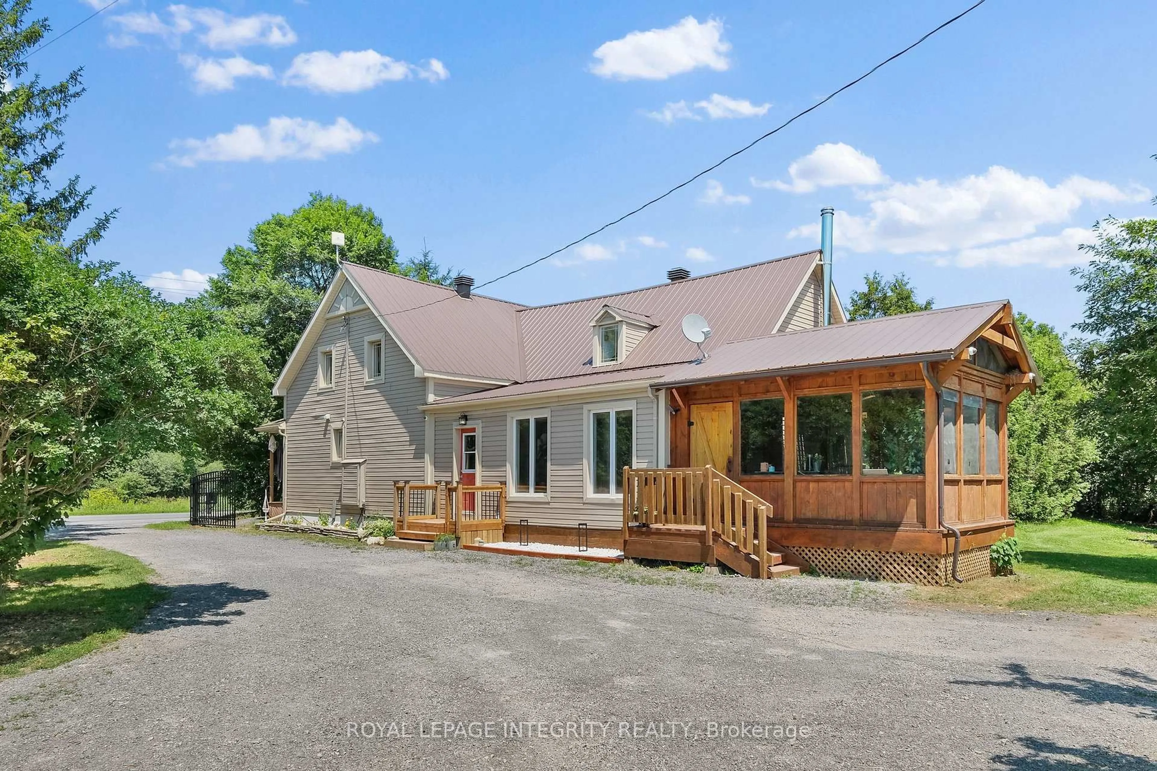 A pic from outside/outdoor area/front of a property/back of a property/a pic from drone, street for 1550 County Rd 2 Rd, Alfred and Plantagenet Ontario K0B 1C0