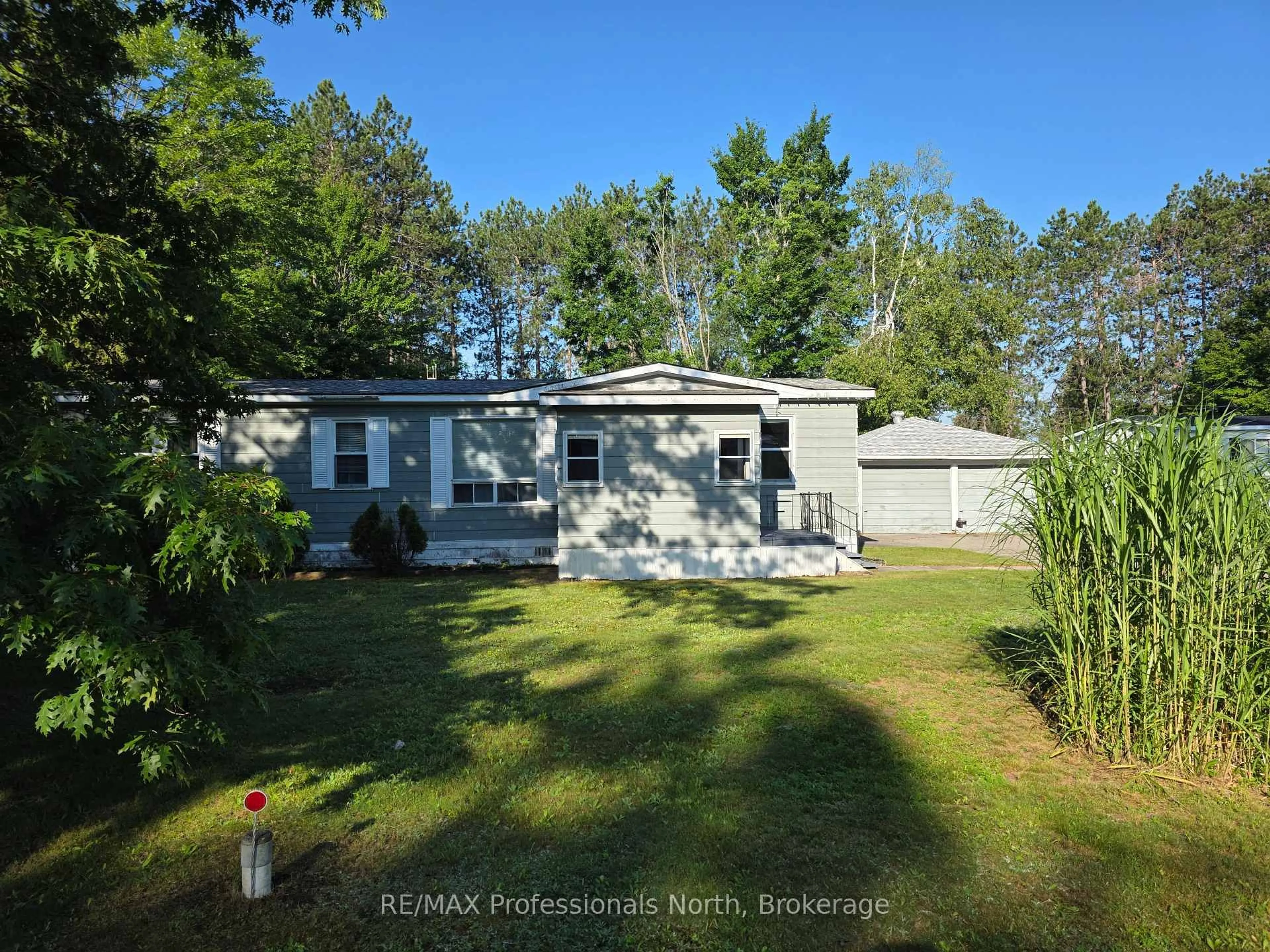 A pic from outside/outdoor area/front of a property/back of a property/a pic from drone, water/lake/river/ocean view for 1024 Lutterworth Pines Rd, Minden Hills Ontario K0M 2K0