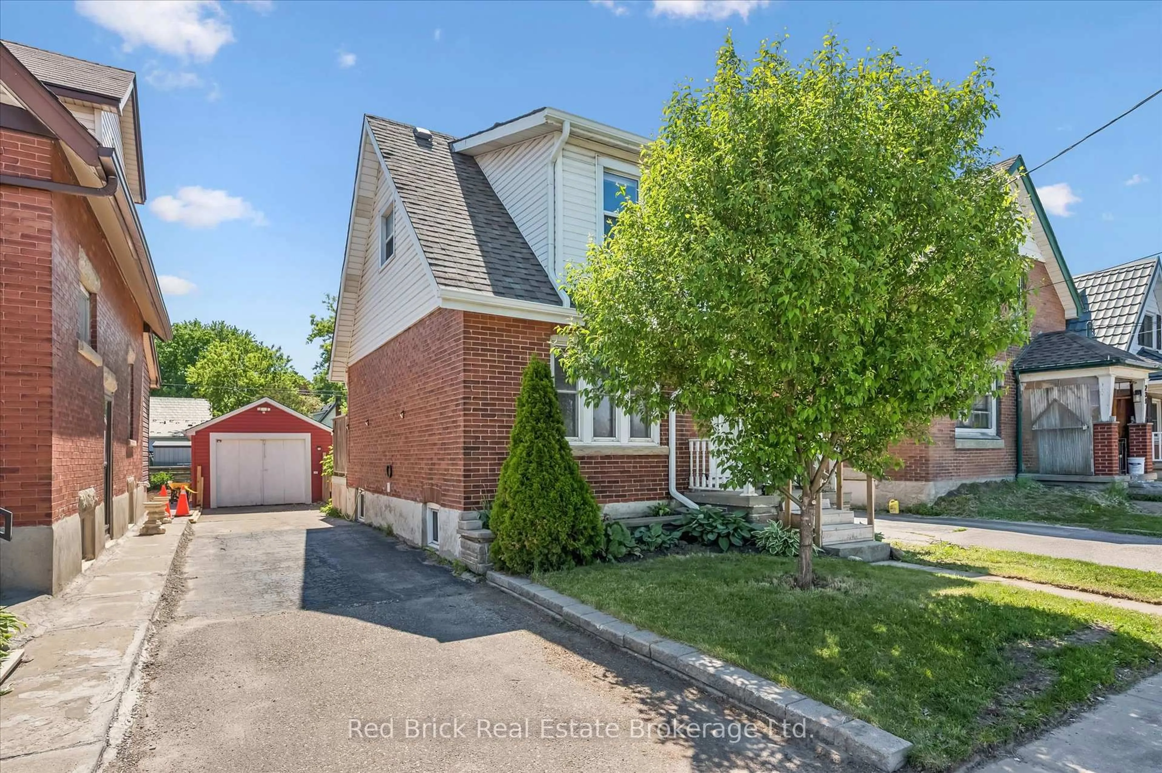Home with brick exterior material, street for 241 Victoria Rd, Guelph Ontario N1E 5P9