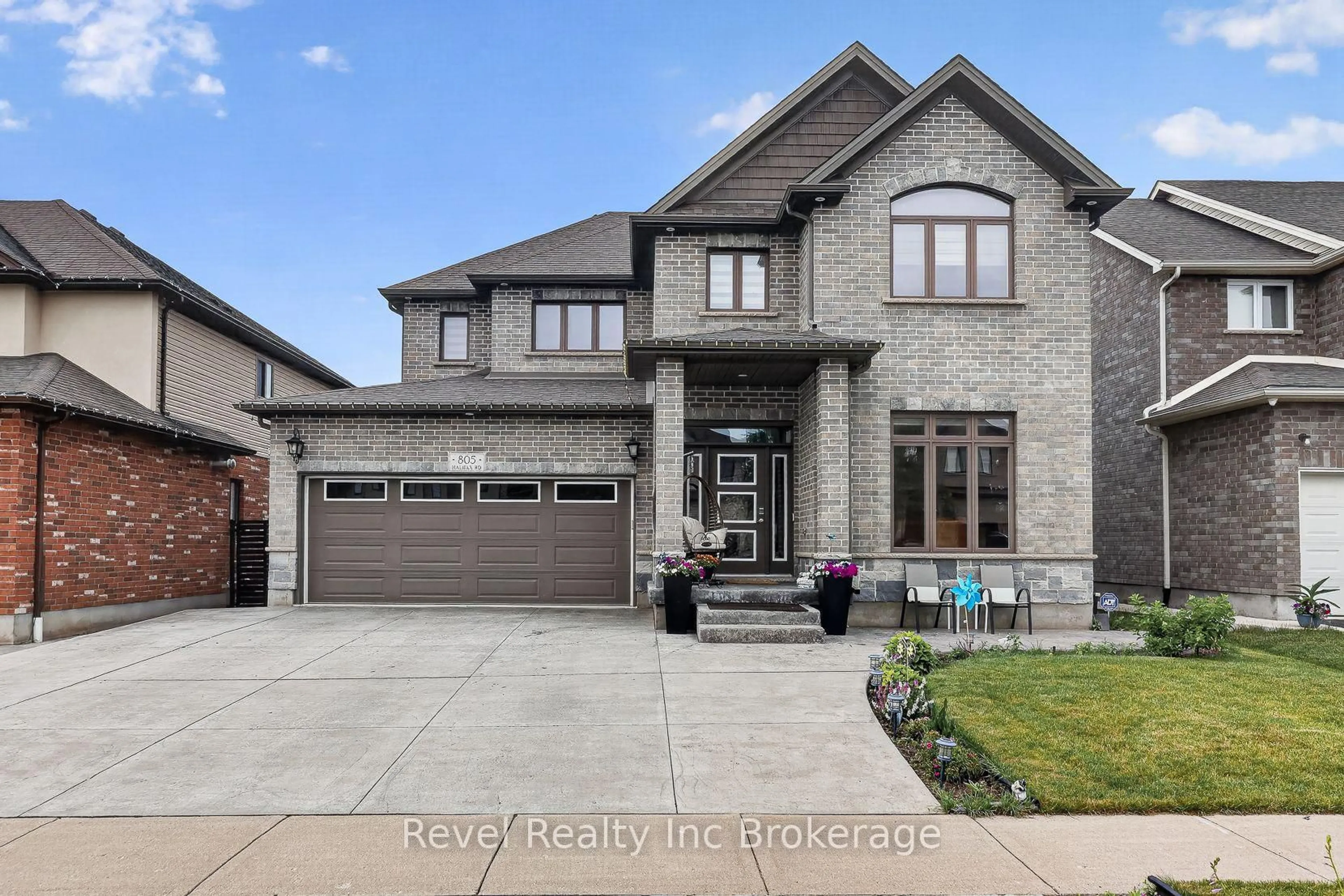 Home with brick exterior material, street for 805 Halifax Rd, Woodstock Ontario N4T 0C6