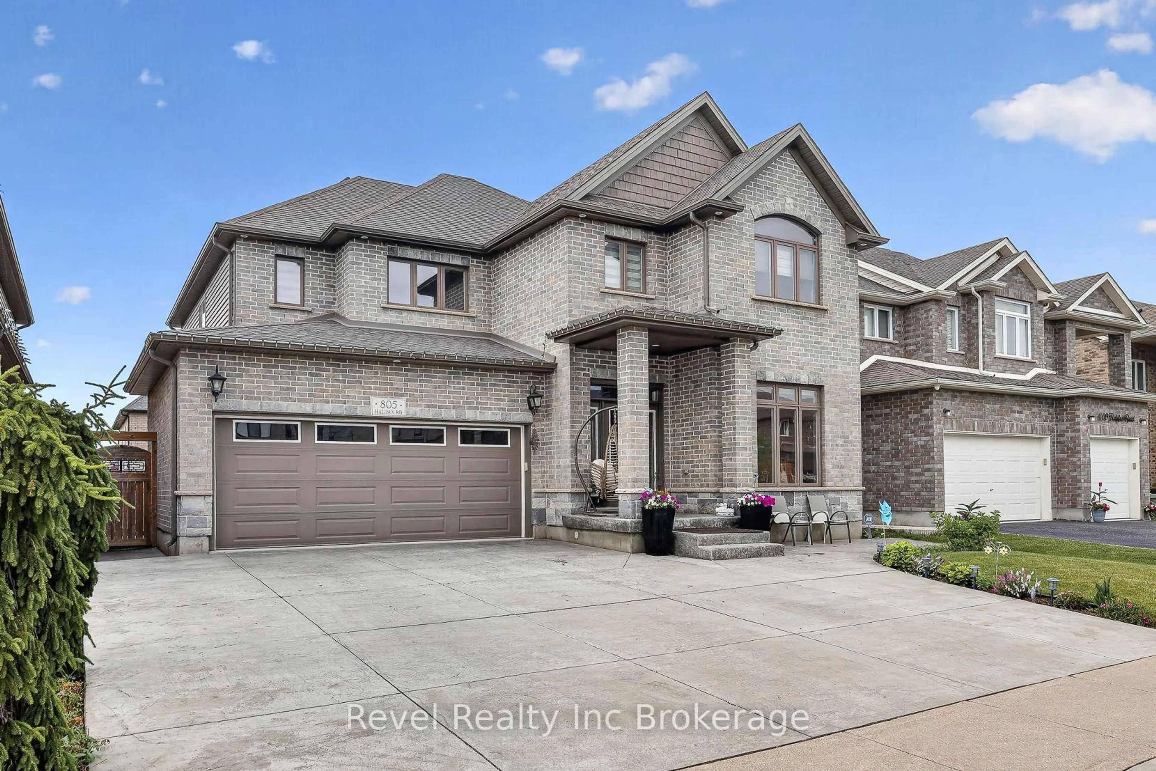 Home with brick exterior material, street for 805 Halifax Rd, Woodstock Ontario N4T 0C6