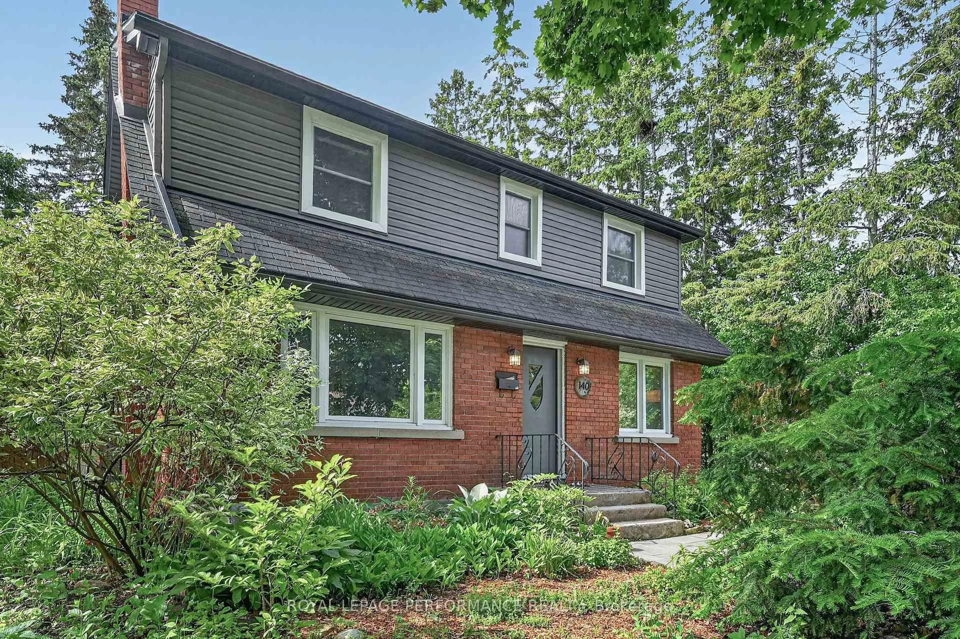 Home with brick exterior material, street for 140 Begonia Ave, Ottawa Ontario K1H 6E4