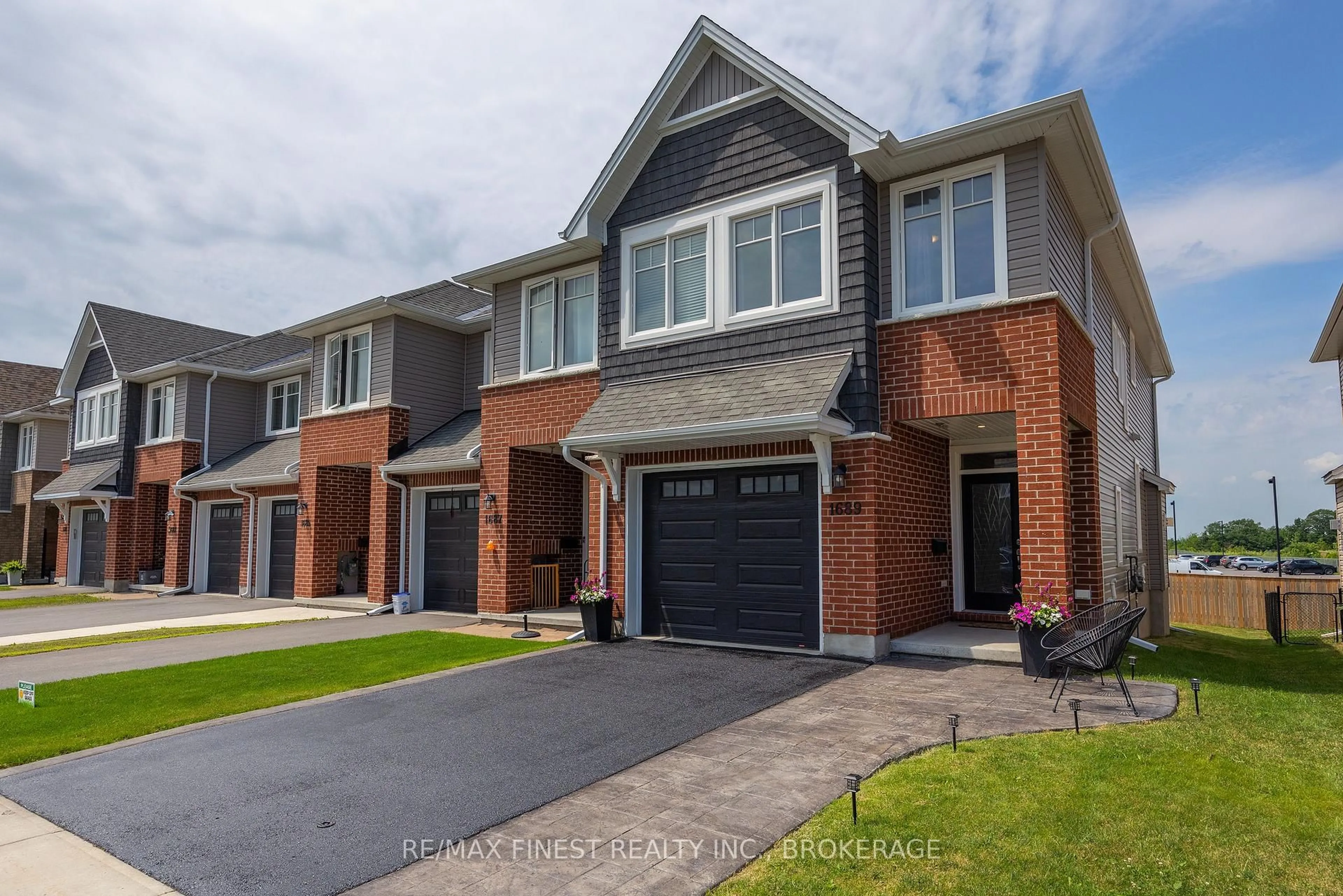 Home with brick exterior material, street for 1689 Tenley Dr, Kingston Ontario K7P 0S5