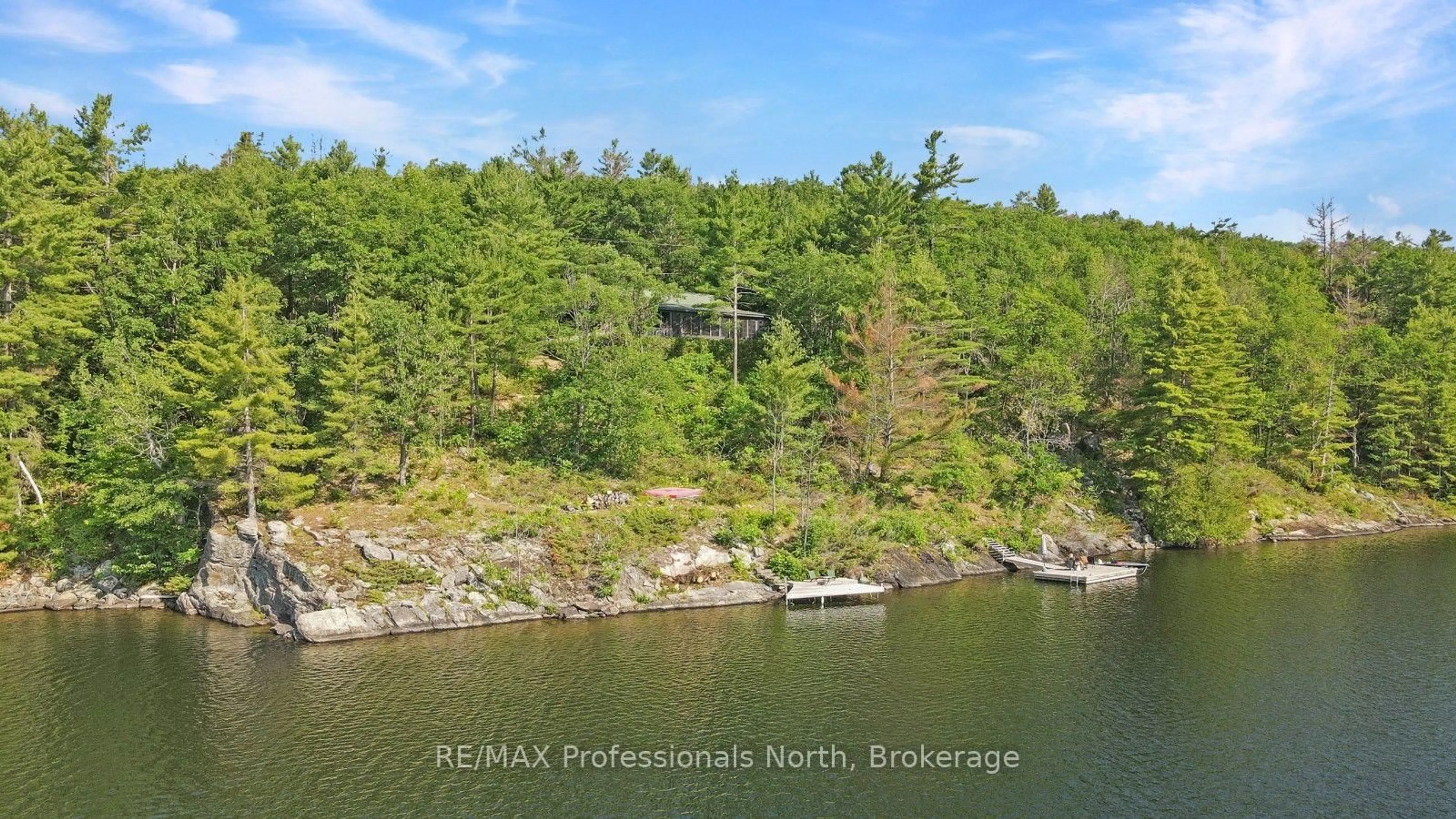 A pic from outside/outdoor area/front of a property/back of a property/a pic from drone, water/lake/river/ocean view for 1101 BEDLINGTON Lane, Minden Hills Ontario K0M 2K0