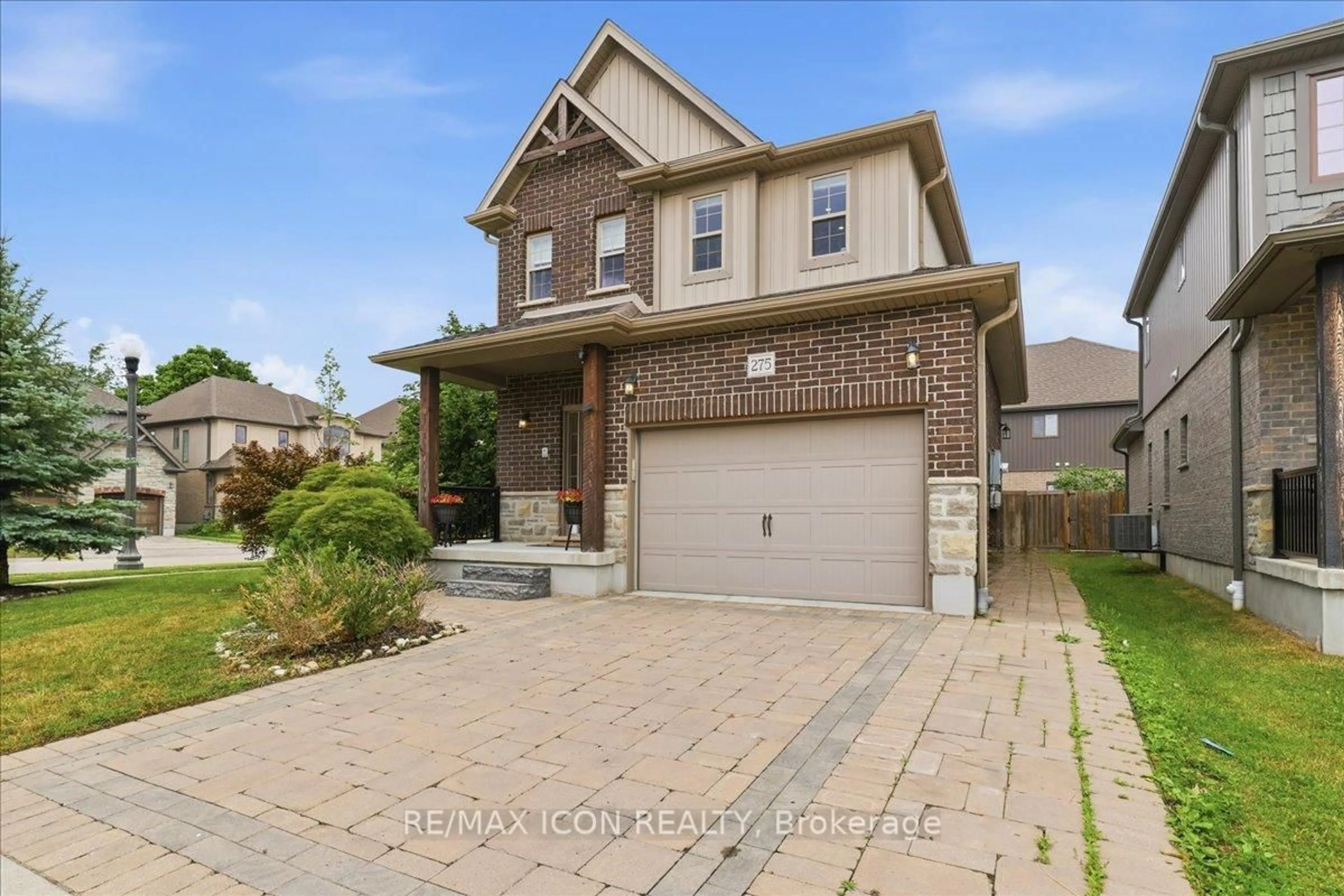 Home with brick exterior material, street for 275 Falconridge Dr, Kitchener Ontario N2K 0C5