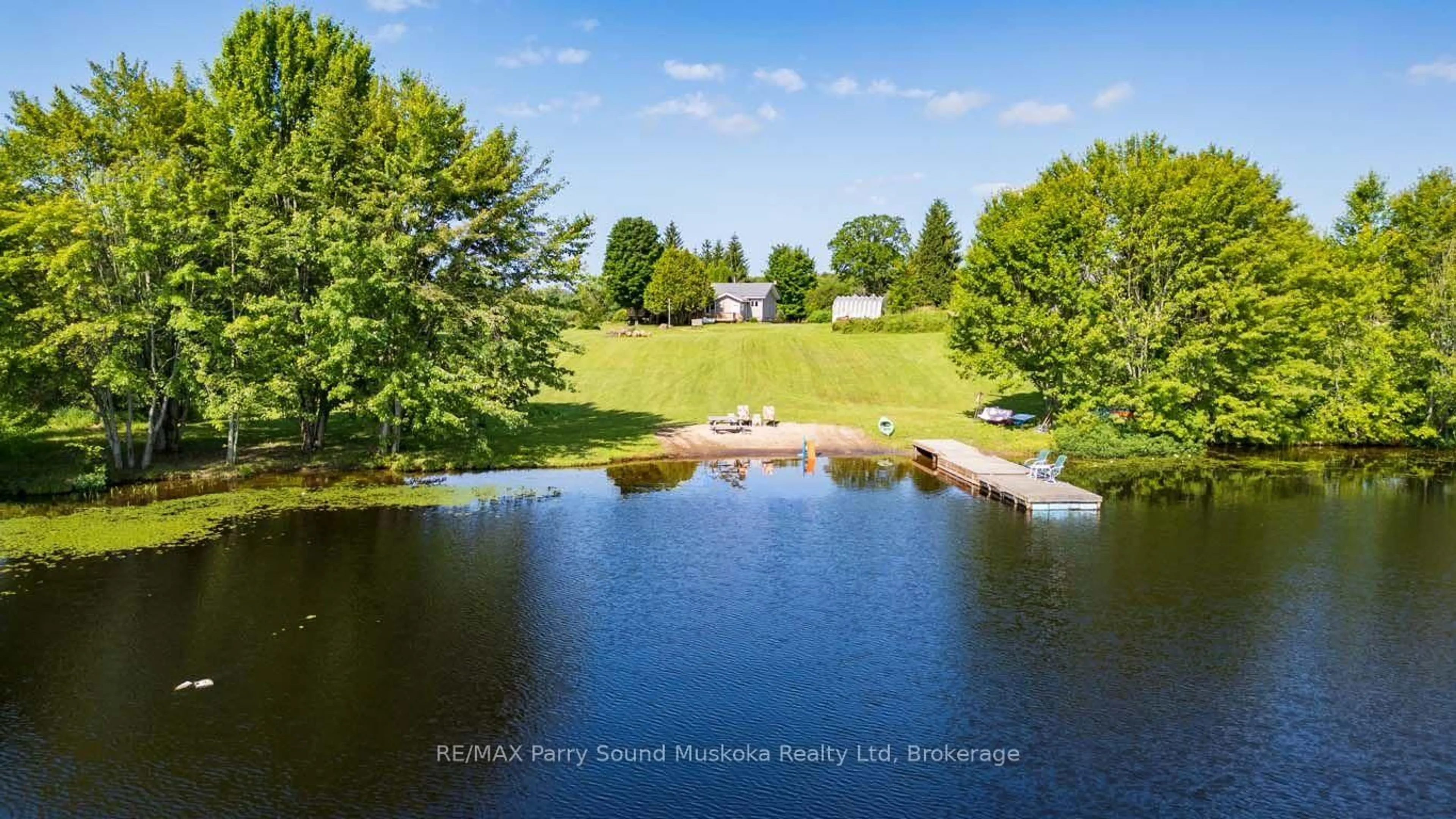 A pic from outside/outdoor area/front of a property/back of a property/a pic from drone, water/lake/river/ocean view for 39 Hardies Rd, McKellar Ontario P2A 0B5