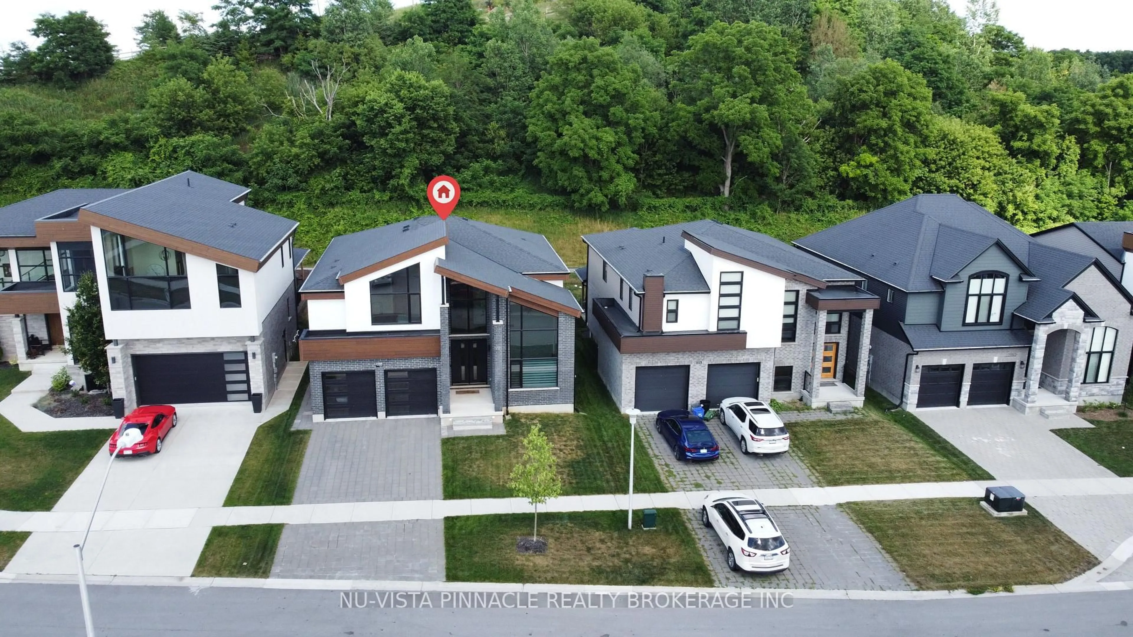 A pic from outside/outdoor area/front of a property/back of a property/a pic from drone, street for 2168 Ironwood Rd, London South Ontario N6K 0H2
