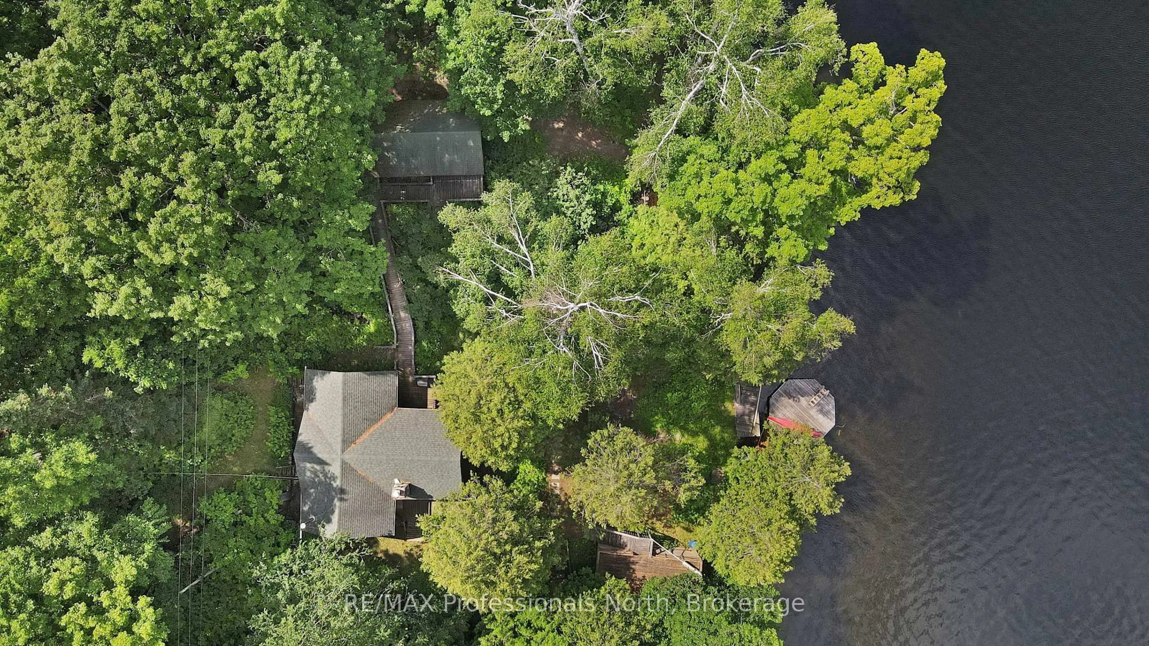 A pic from outside/outdoor area/front of a property/back of a property/a pic from drone, water/lake/river/ocean view for 1358 Grace River Rd, Dysart et al Ontario K0L 1M1