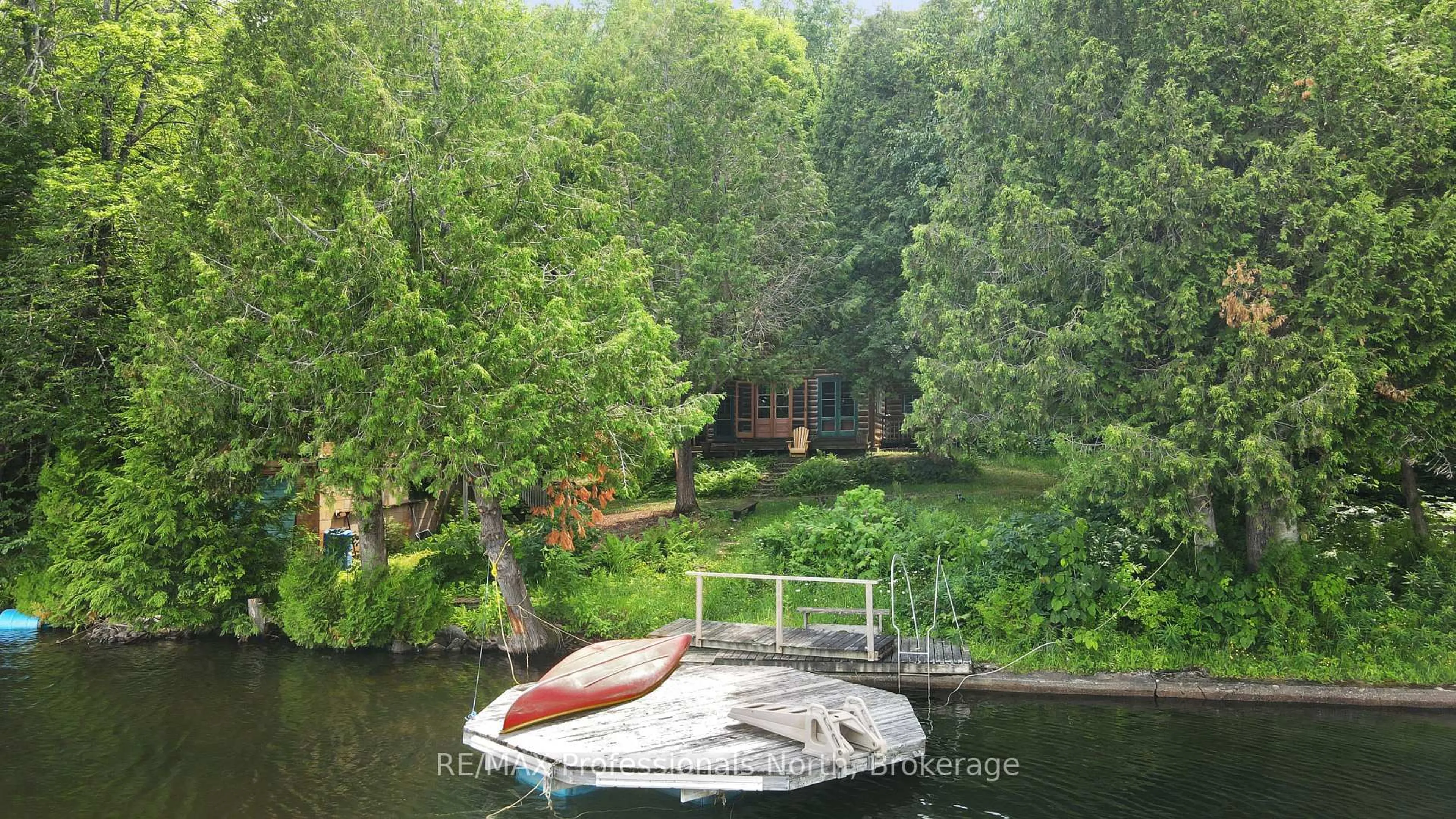 A pic from outside/outdoor area/front of a property/back of a property/a pic from drone, water/lake/river/ocean view for 1358 Grace River Rd, Dysart et al Ontario K0L 1M1