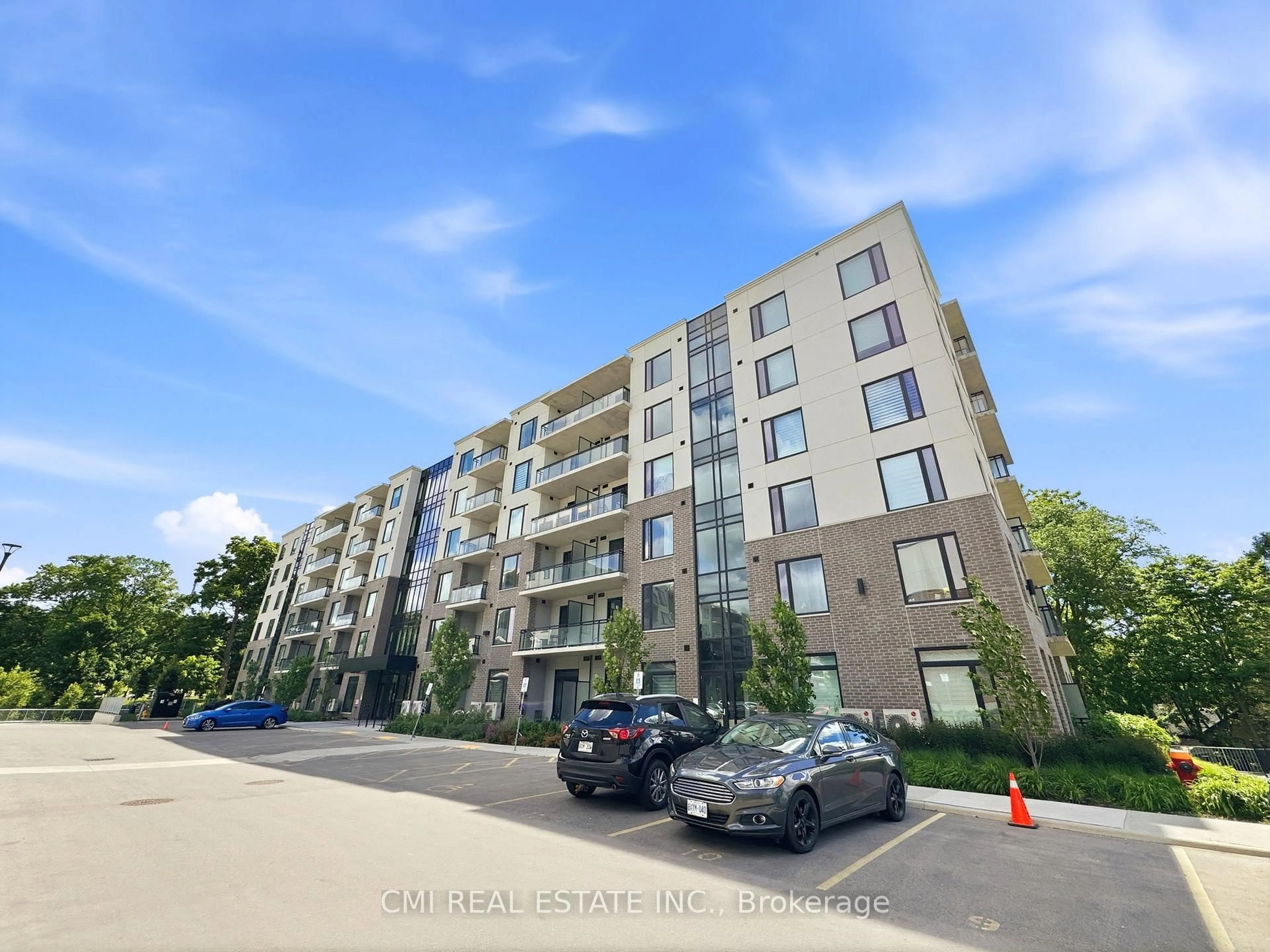 A pic from outside/outdoor area/front of a property/back of a property/a pic from drone, street for 103 Roger St #306, Waterloo Ontario N2J 0G2