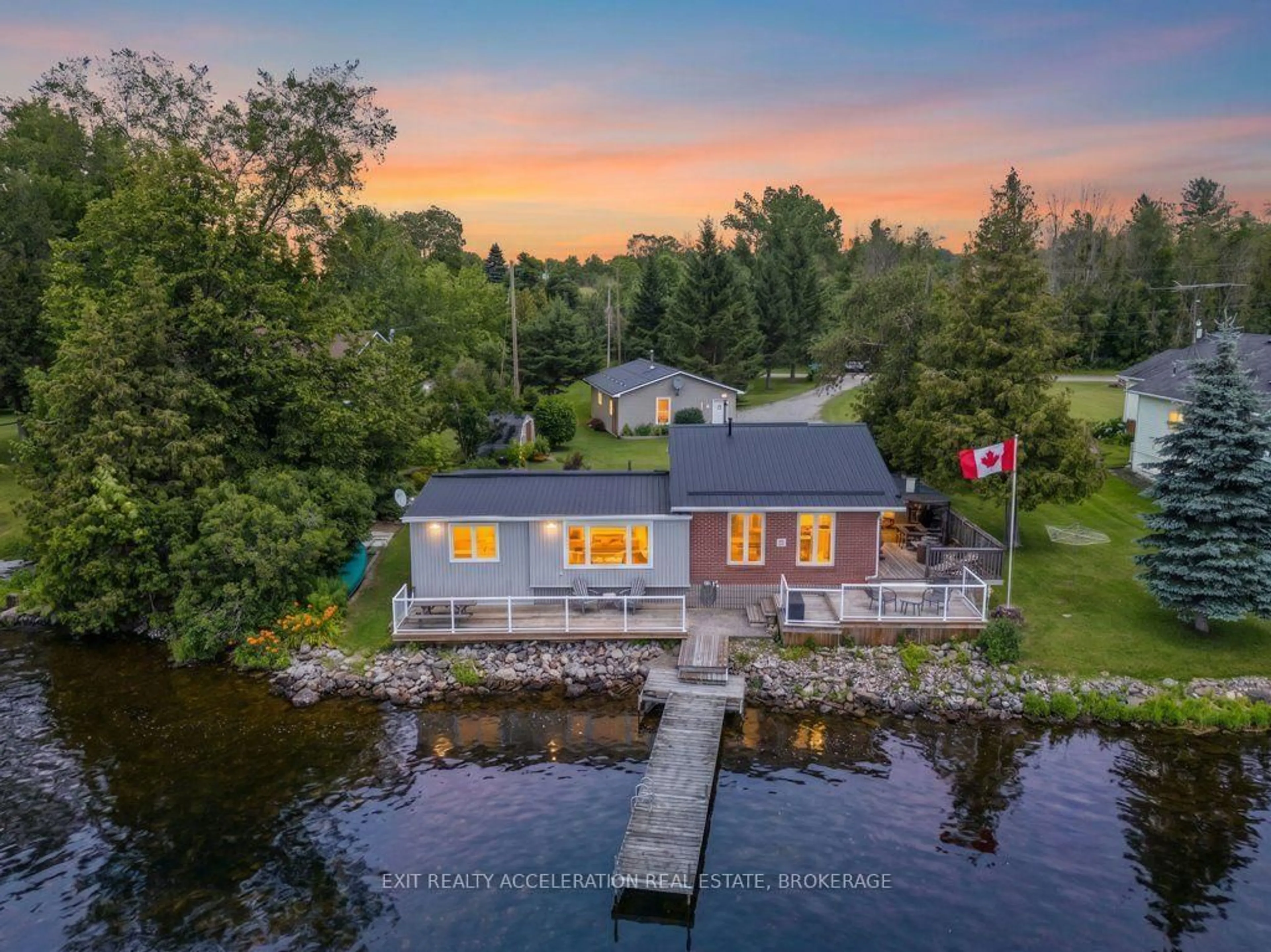 A pic from outside/outdoor area/front of a property/back of a property/a pic from drone, water/lake/river/ocean view for 40 Oak Lane, Tamworth Ontario K0K 3G0
