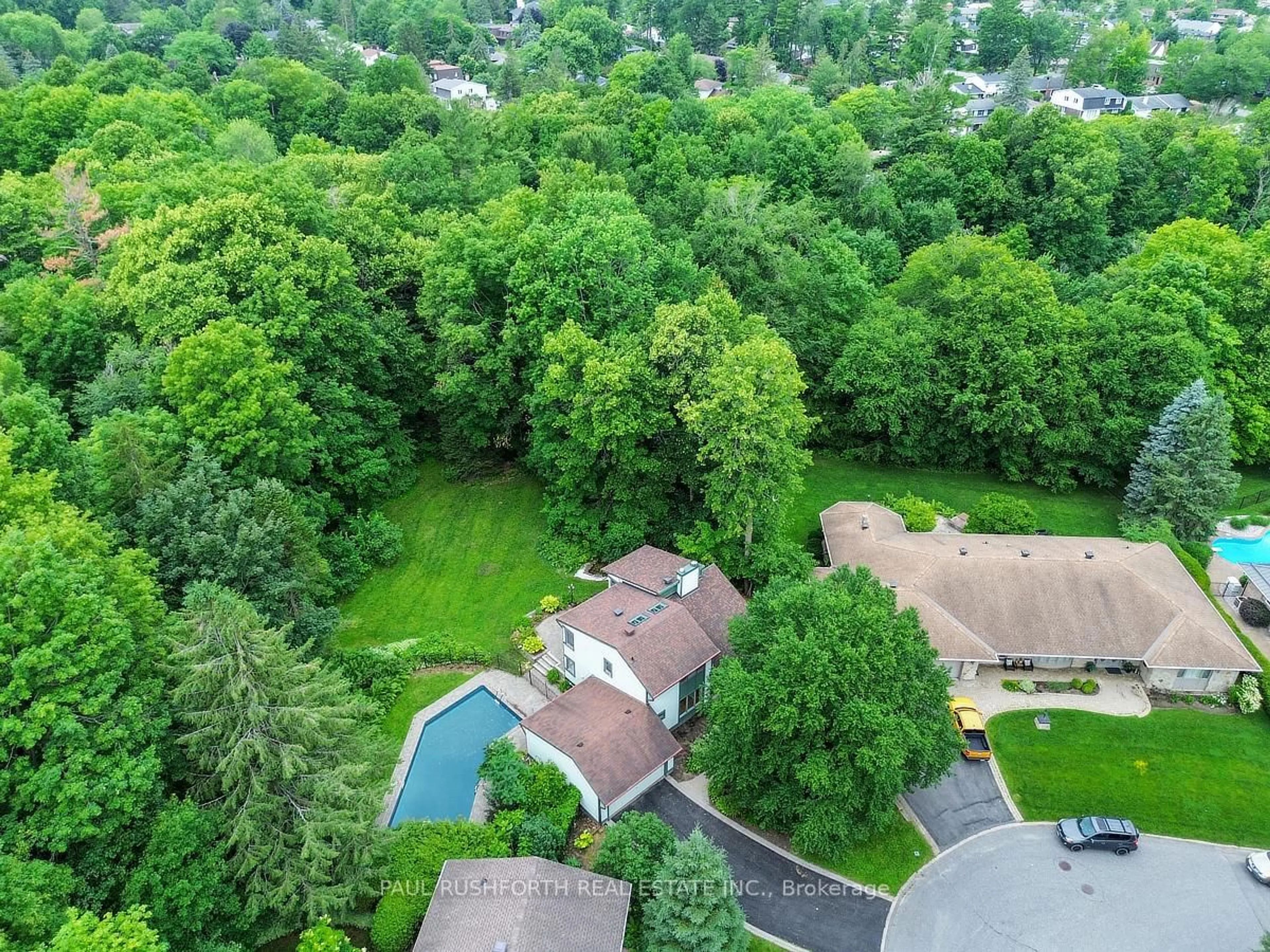 A pic from outside/outdoor area/front of a property/back of a property/a pic from drone, forest/trees view for 33 Camwood Cres, Ottawa Ontario K2H 7X1