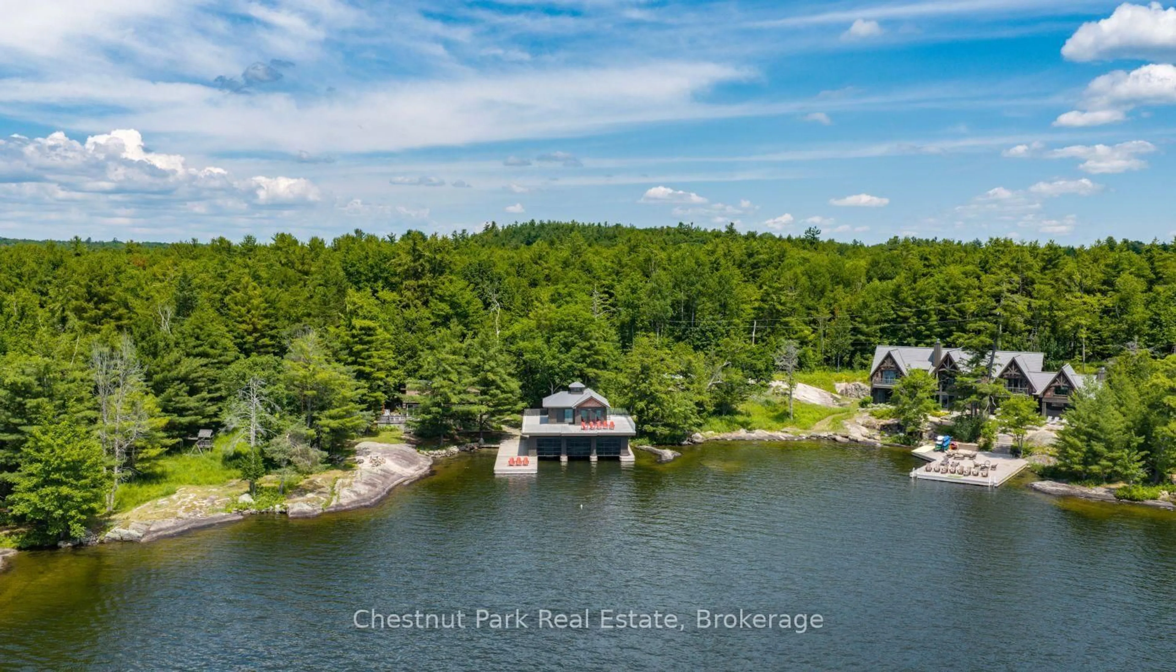 A pic from outside/outdoor area/front of a property/back of a property/a pic from drone, water/lake/river/ocean view for 1413 Brackenrig Rd #2 & 3, Muskoka Lakes Ontario P0B 1J0