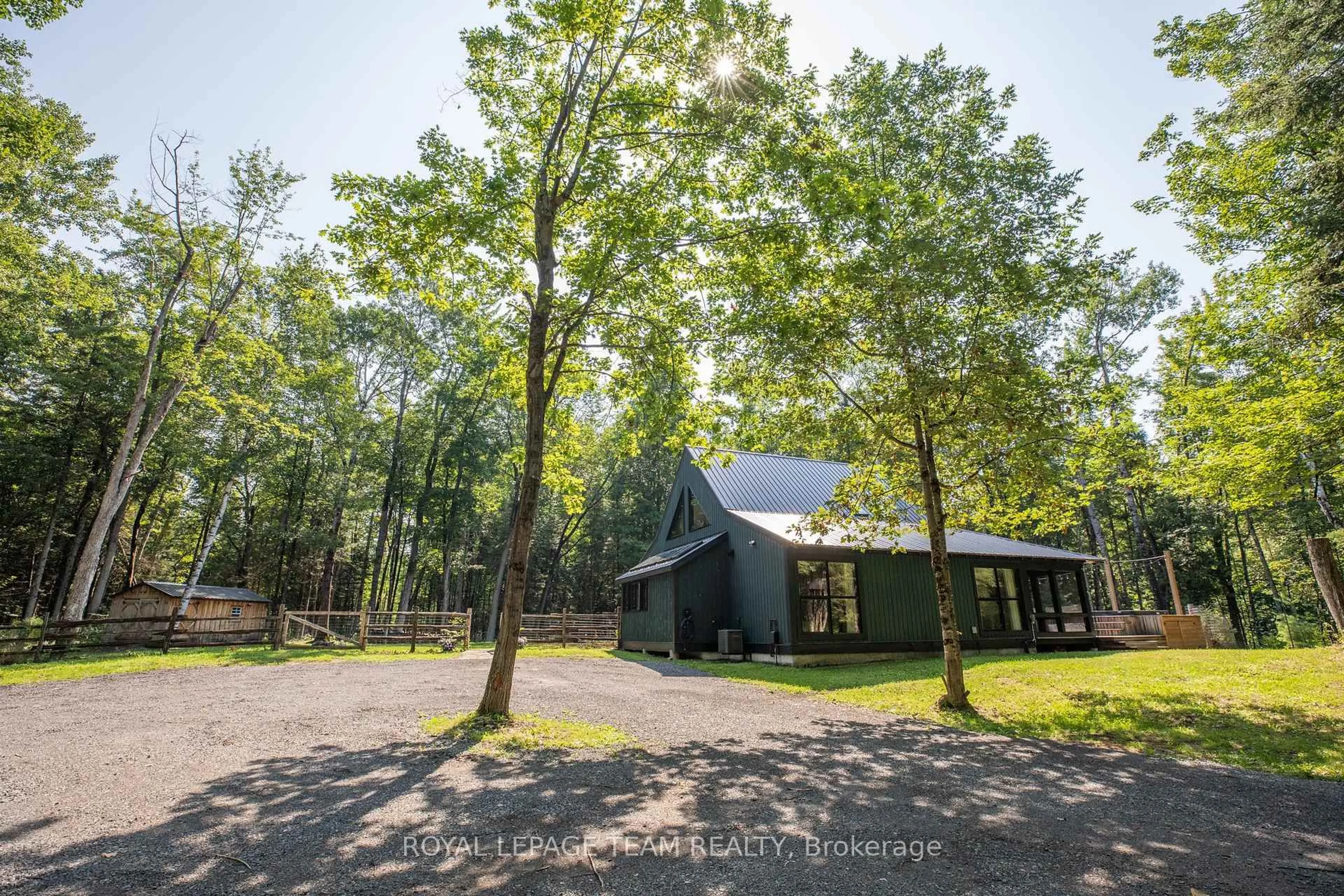 A pic from outside/outdoor area/front of a property/back of a property/a pic from drone, forest/trees view for 4309 Armitage Ave, Ottawa Ontario K0A 1T0