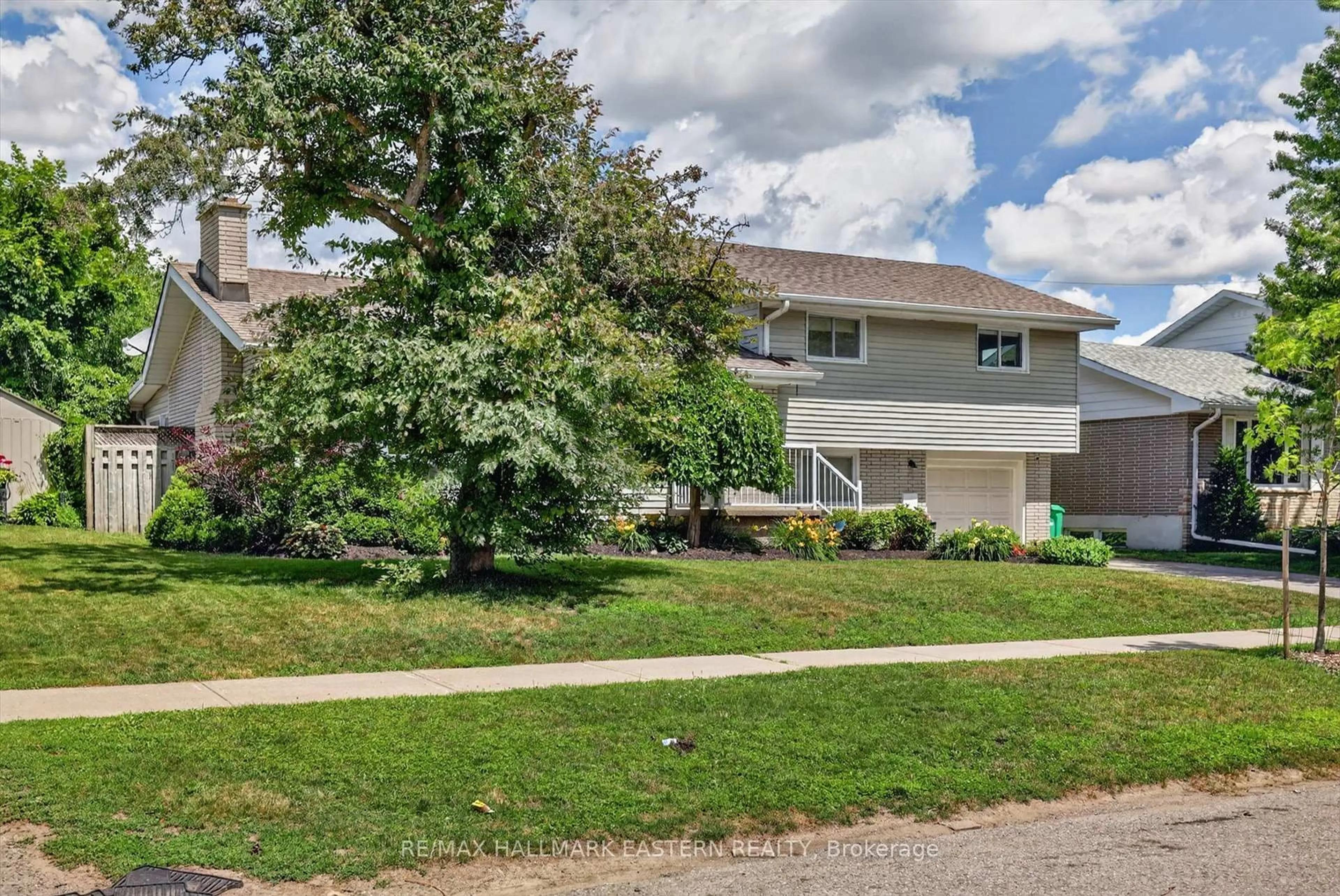 Home with vinyl exterior material, street for 894 Kawartha Dr, Peterborough Ontario K9J 6L3