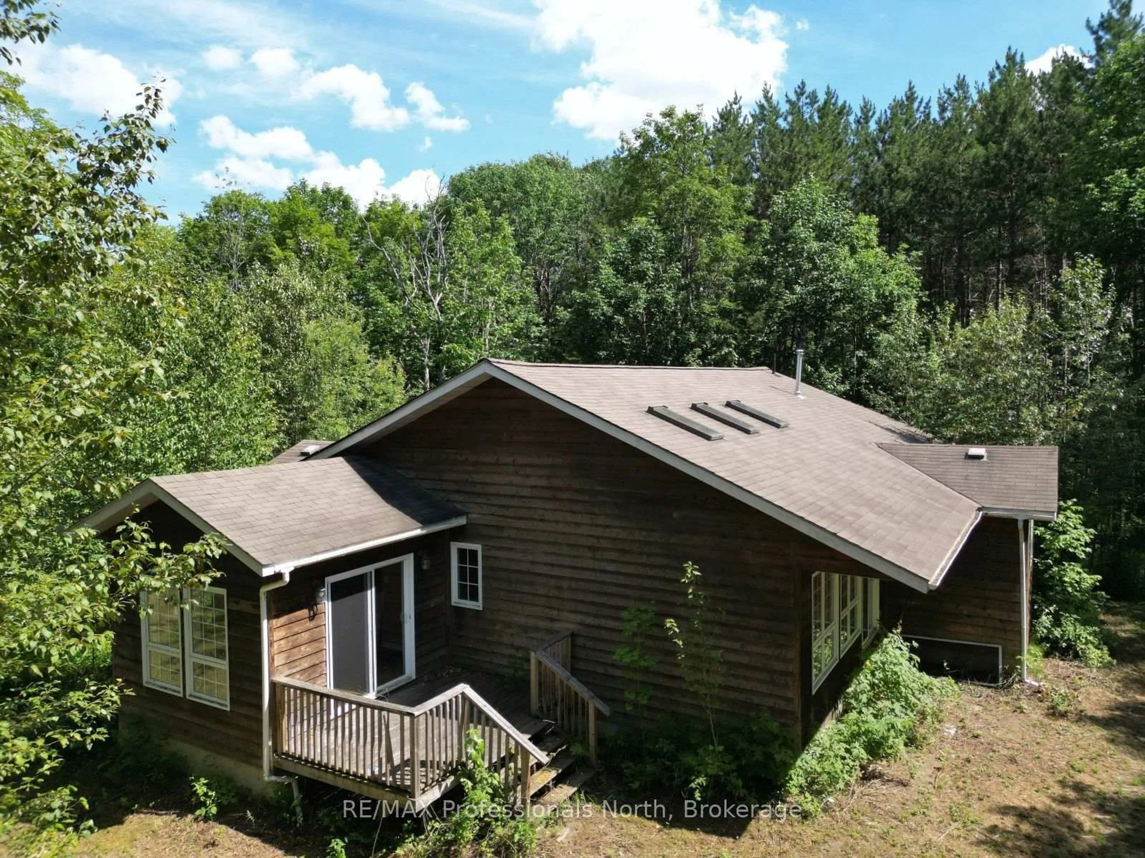 A pic from outside/outdoor area/front of a property/back of a property/a pic from drone, unknown for 1170 Bushwolf Lake Rd, Dysart et al Ontario K0M 1S0