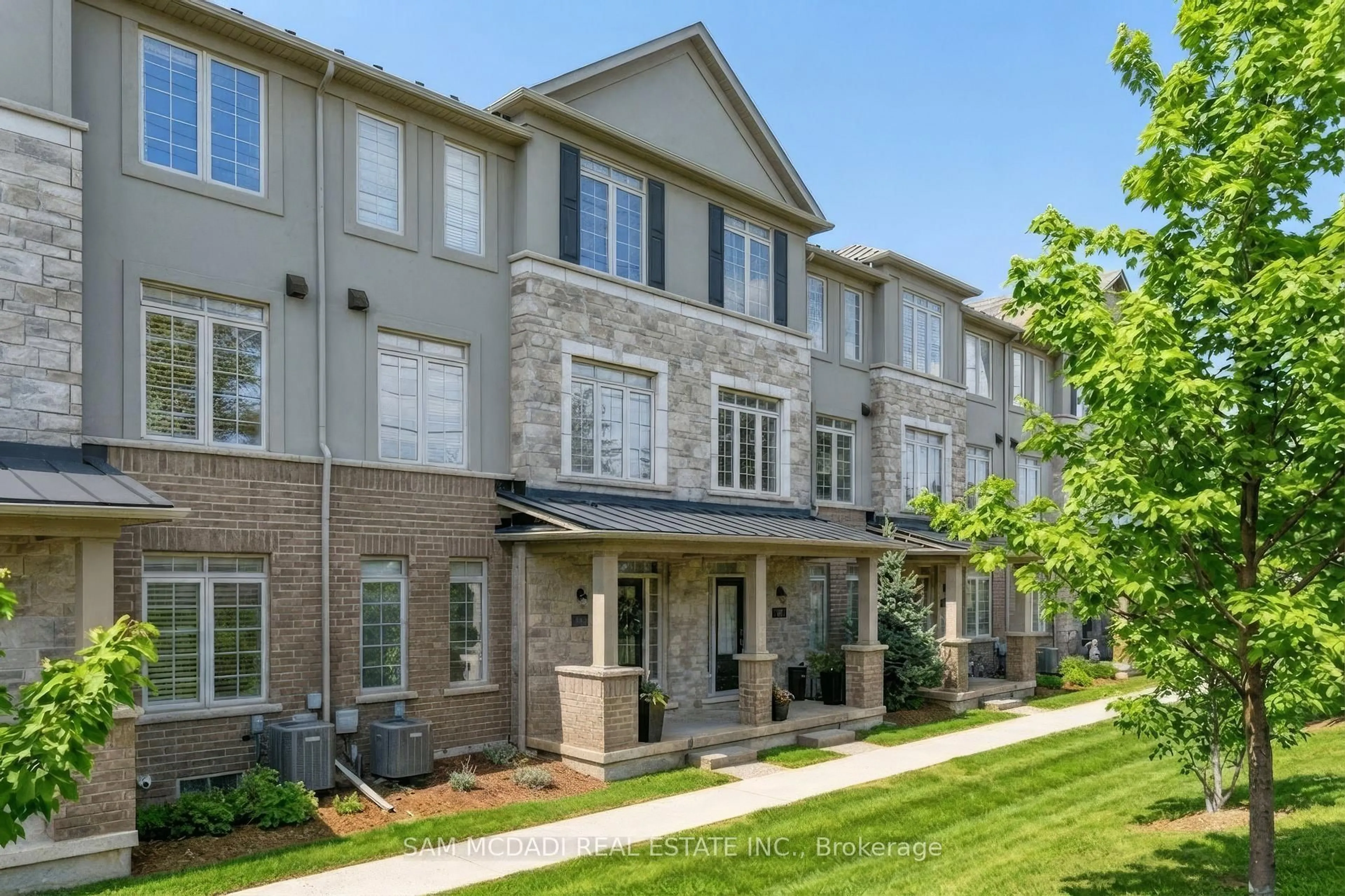 Home with brick exterior material, street for 215 Dundas St #9, Hamilton Ontario L8B 0X2