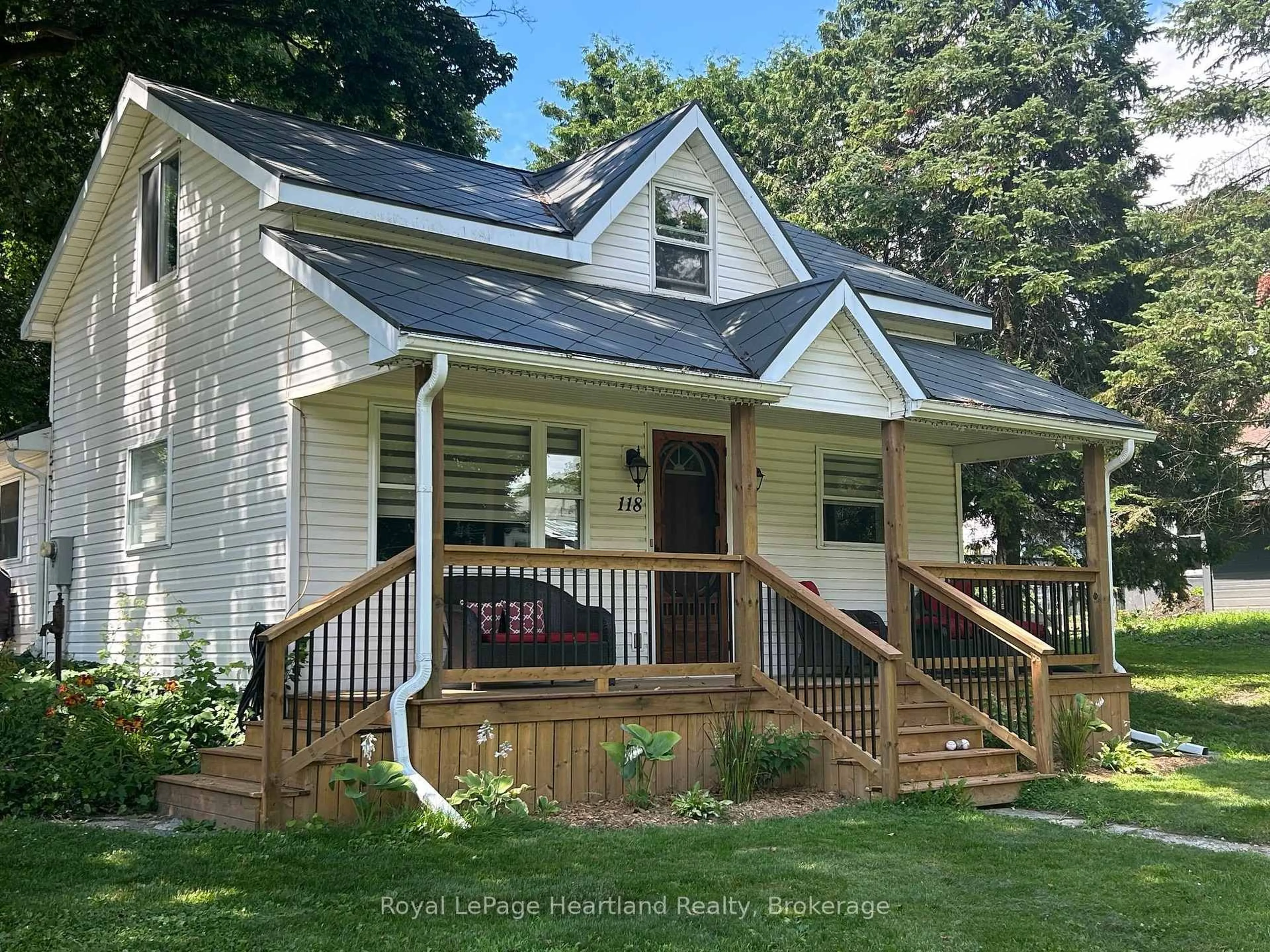 Home with vinyl exterior material, street for 118 ISAAC St, Central Huron Ontario N0M 1L0