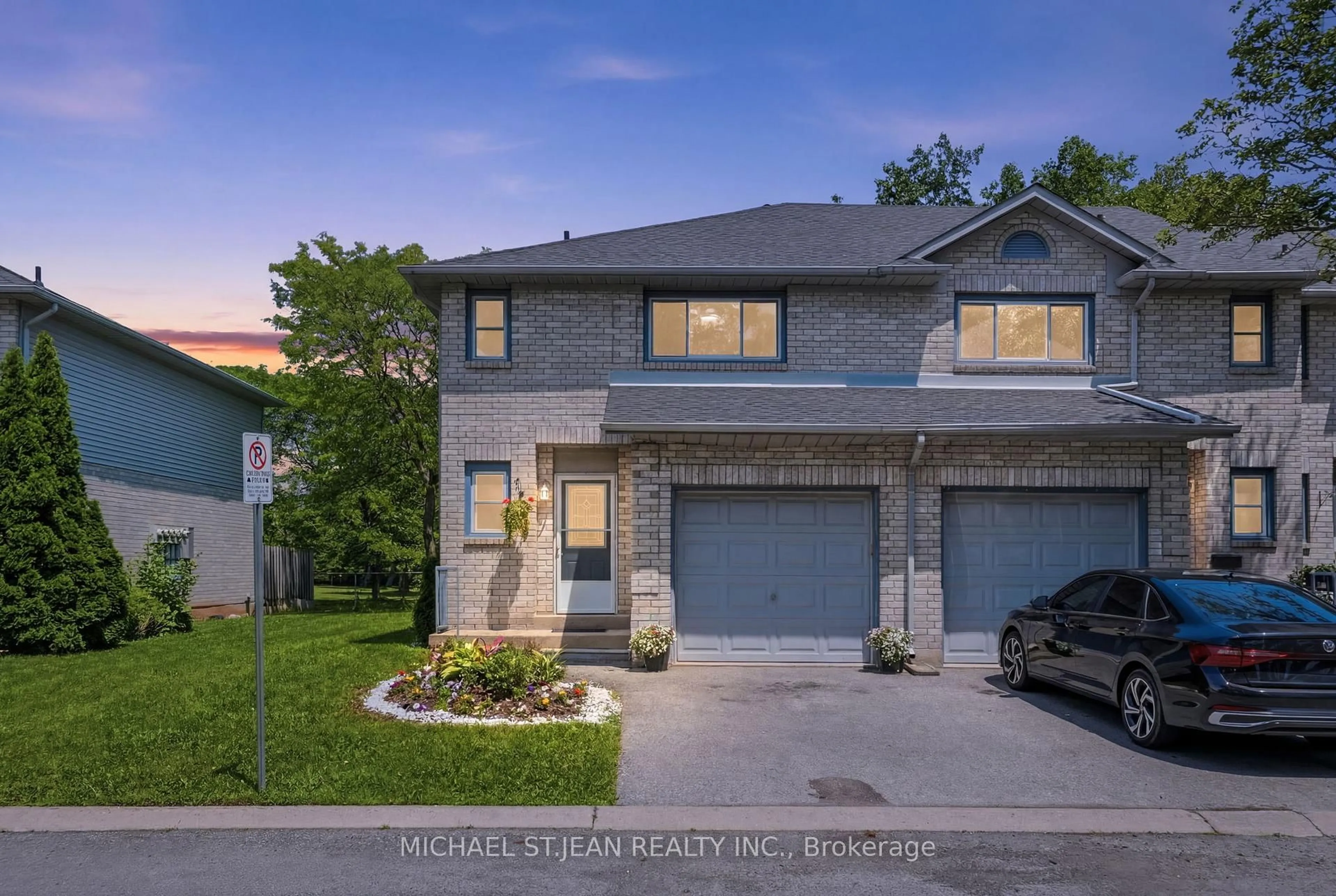 Home with brick exterior material, street for 2 Royalwood Crt #51, Hamilton Ontario L8E 4Z1