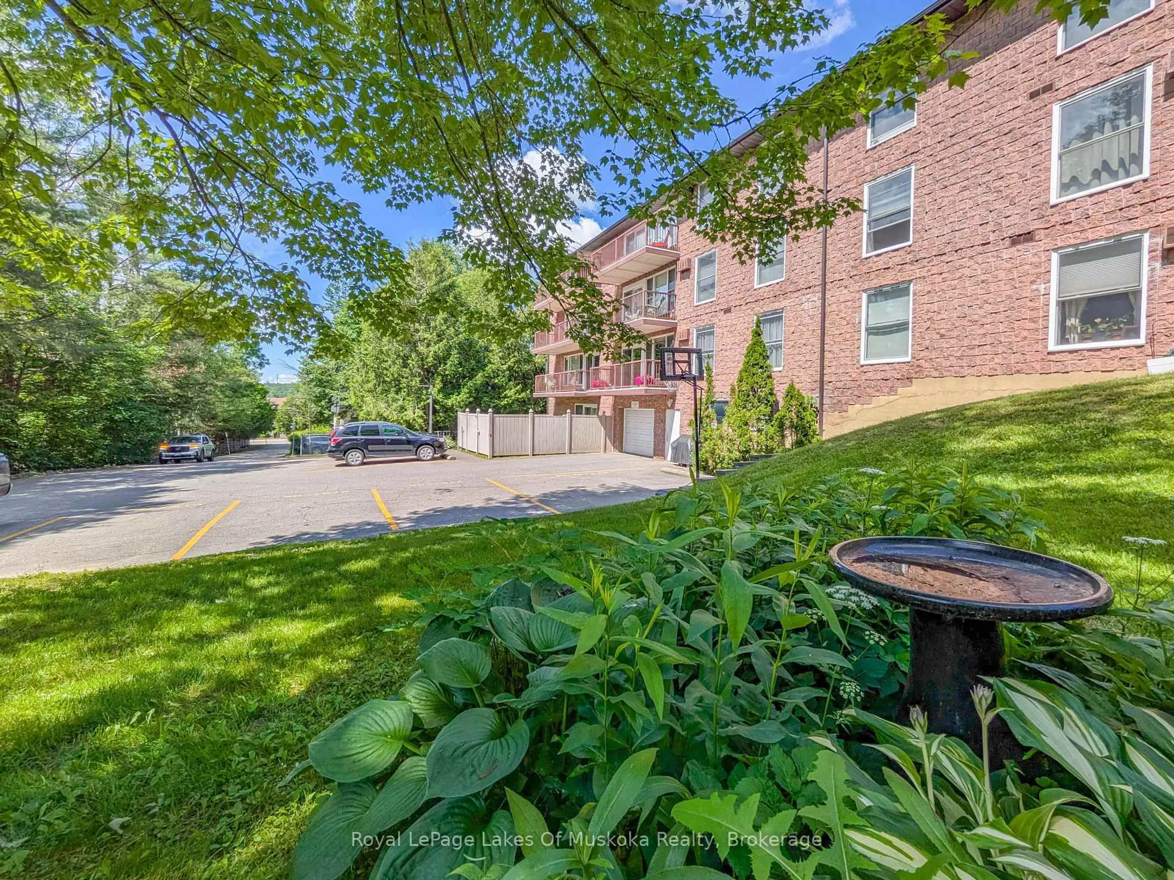A pic from outside/outdoor area/front of a property/back of a property/a pic from drone, street for 38 Monck Rd #101, Bracebridge Ontario P1L 1P4