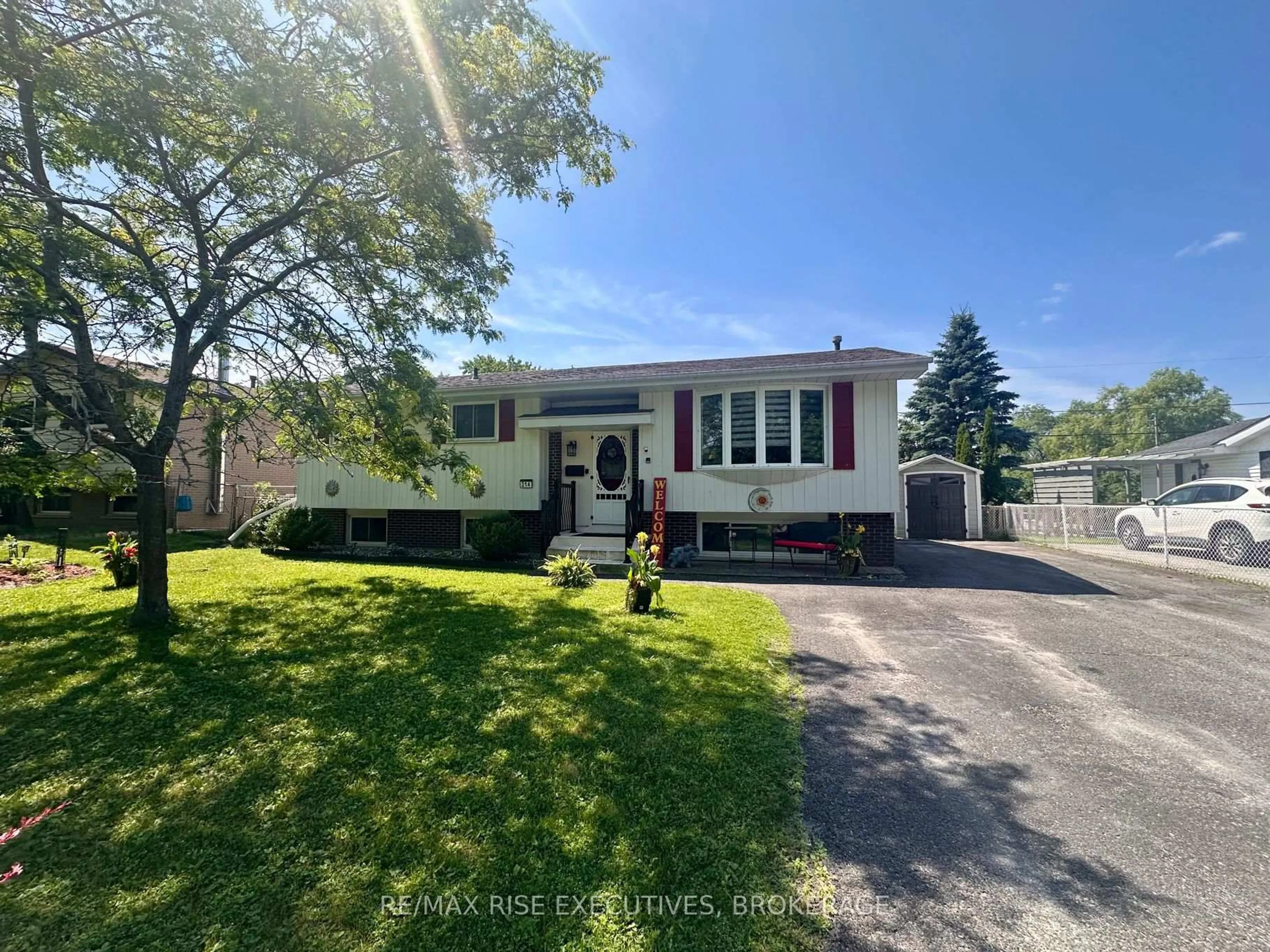 Home with vinyl exterior material, street for 214 Amherst Dr, Loyalist Ontario K7N 1T4