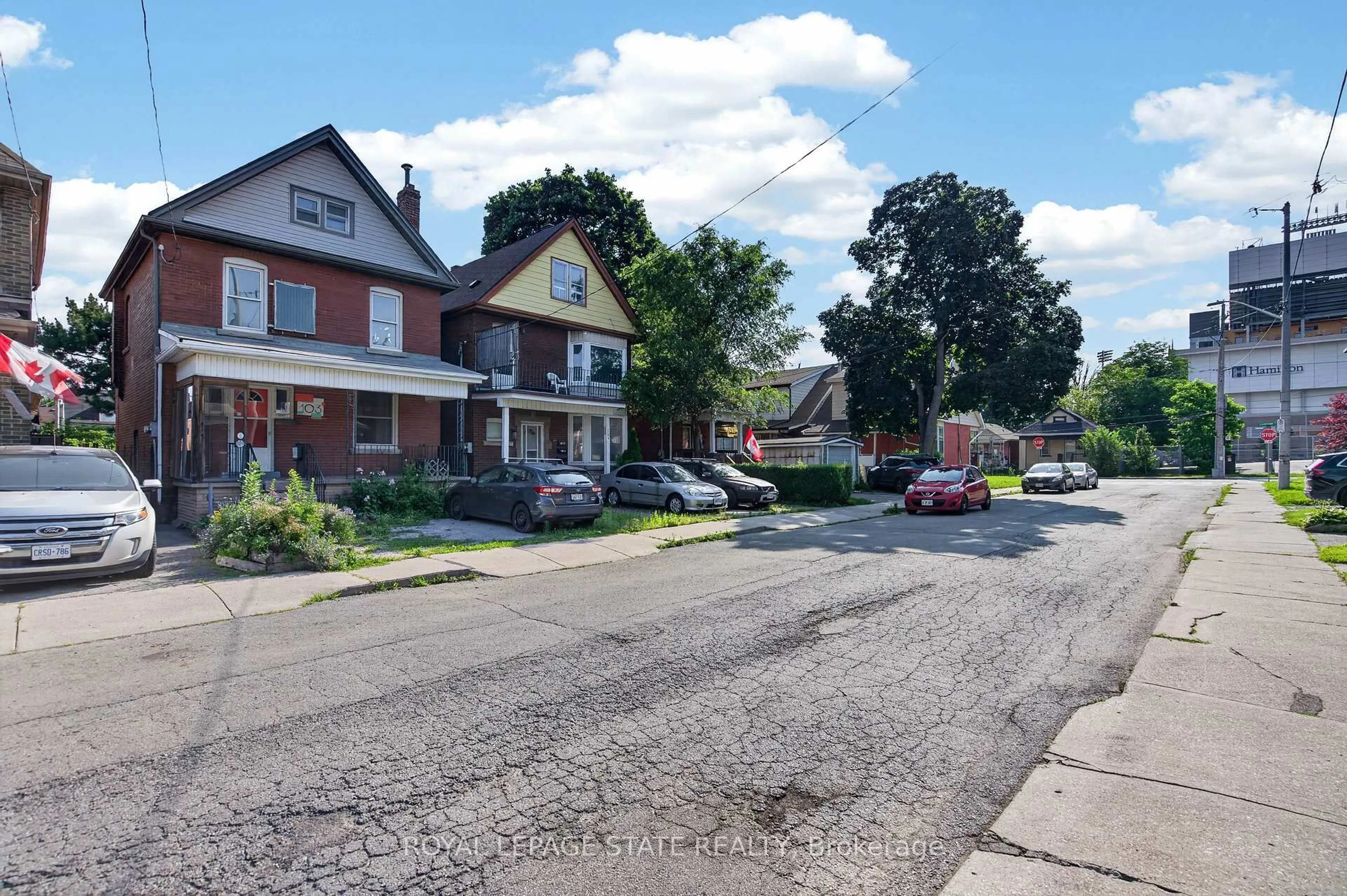 A pic from outside/outdoor area/front of a property/back of a property/a pic from drone, street for 103 Rosemont Ave, Hamilton Ontario L8L 2M6