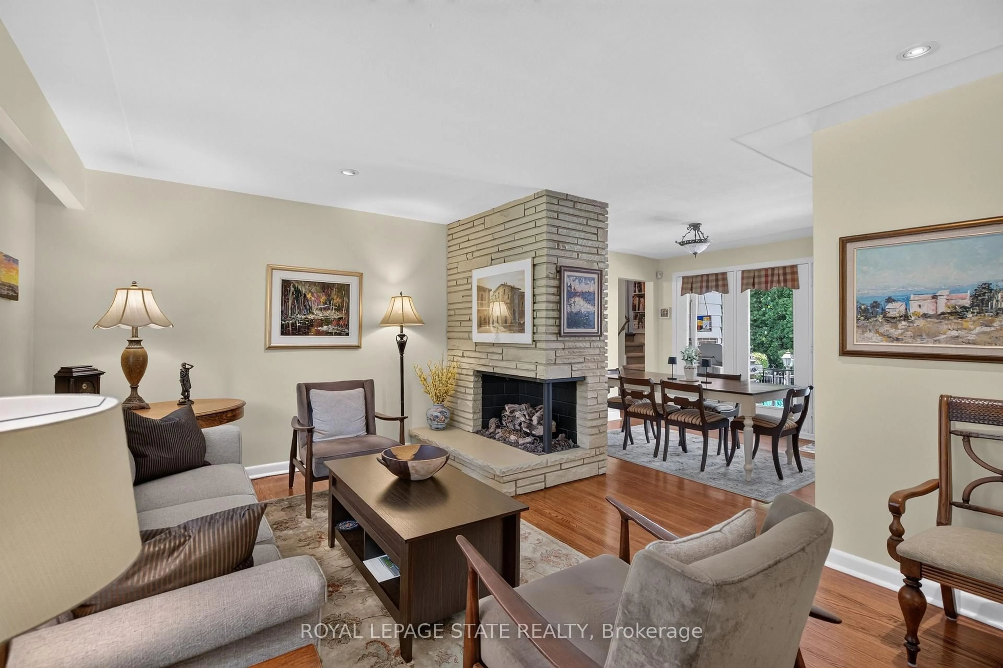 Living room with furniture, ceramic/tile floor for 657 Iroquois Ave, Hamilton Ontario L9G 3B6